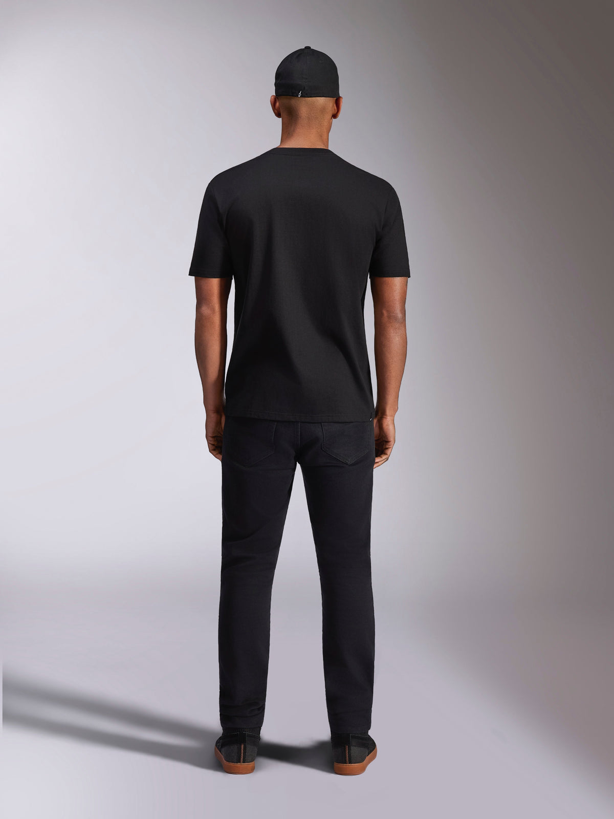Alpinestars Plate CSF Tee, Short Sleeve T-Shirt, Black, back view on model, worn with black cap and pants, casual motorsport streetwear
