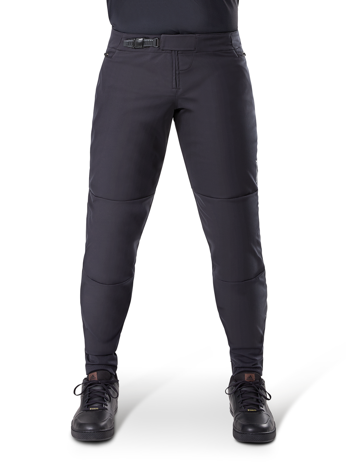 Alpinestars A-Dura Thermal Pant, Black mountain bike pants, featuring a secure ratchet closure and pre-curved fit, worn with black cycling shoes, durable technical material for cold-weather trail riding
