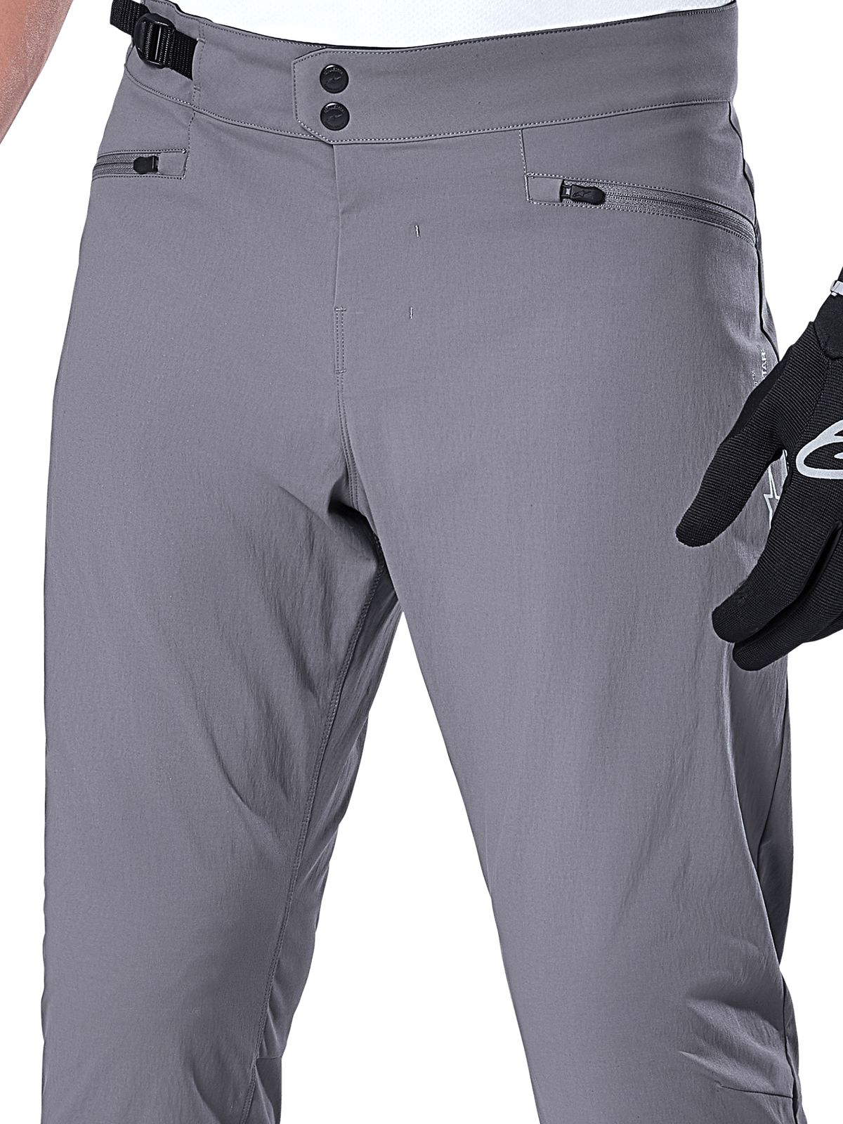 Alpinestars A-Dura Hose, MTB-Hose, Dunkelgrau, Nahaufnahme des Taillenbereichs mit doppeltem Druckknopfverschluss, verstellbarem seitlichem Taillenversteller und Reißverschlusstaschen, strapazierfähiges Stretchmaterial für Mountainbiking