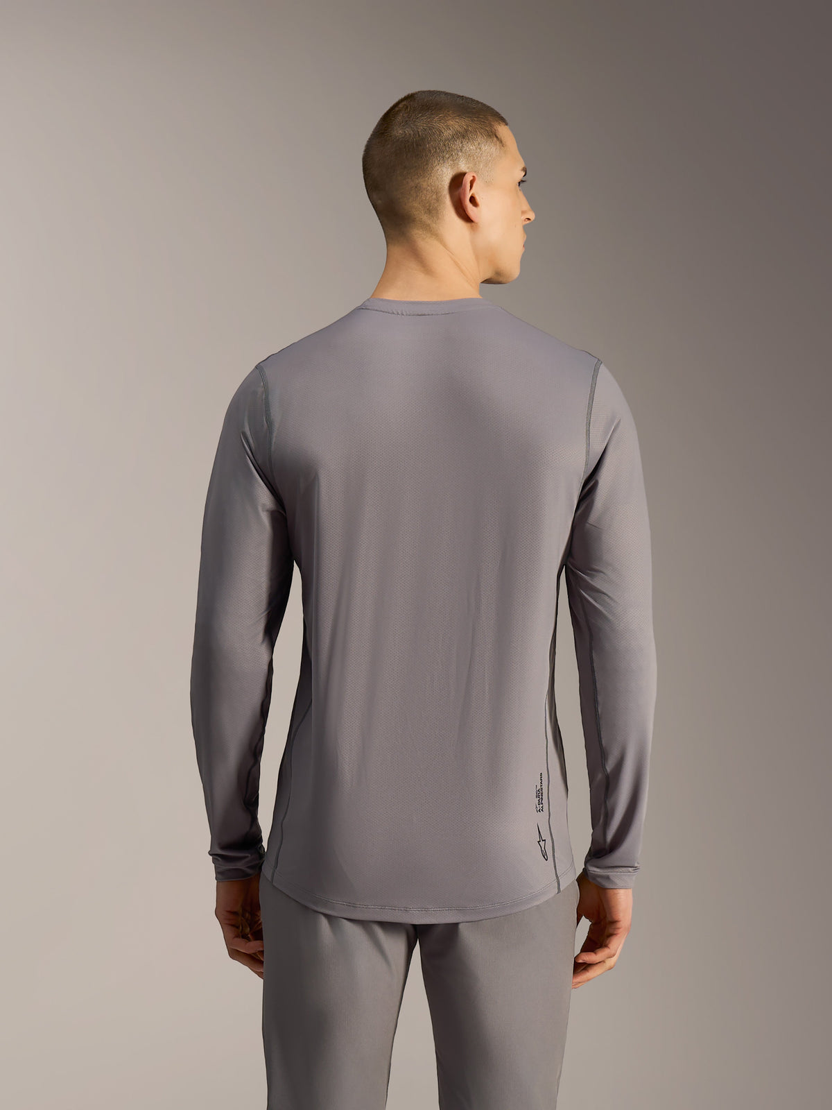A-Dura Ride Long Sleeve Jersey in Gray, performance MTB jersey with jacquard stretch fabric and a dropped tail.