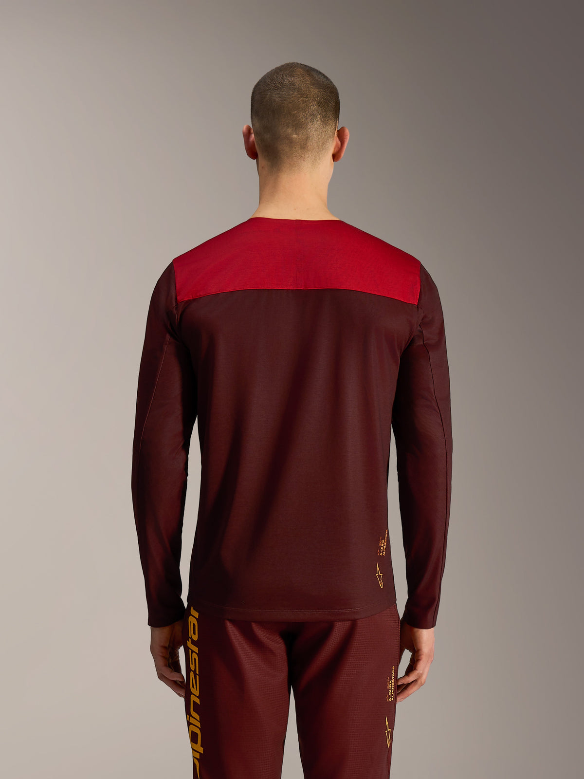 Alpinestars A-Dura Elite Jersey 2.0 Long Sleeve, Bordeaux with red shoulder panel, back view of performance MTB gear.