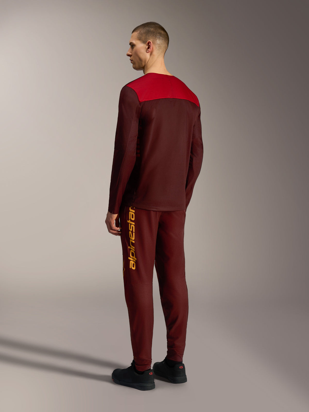 Alpinestars A-Dura Elite 2.0 Long Sleeve Jersey in Bordeaux and red, back view of technical MTB trail apparel.