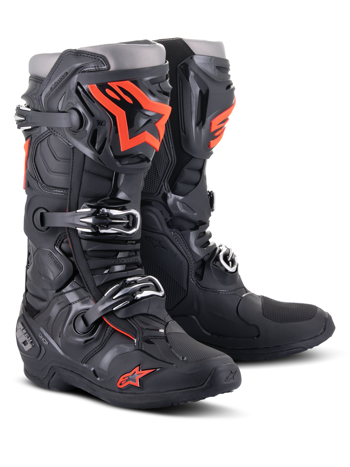 Alpinestars Tech 10 Boots, Motocross Boots, Black and Fluorescent Red, featuring a triple buckle closure system, technical TPU shell, and bold orange logos, professional-grade protective footwear for off-road racing.