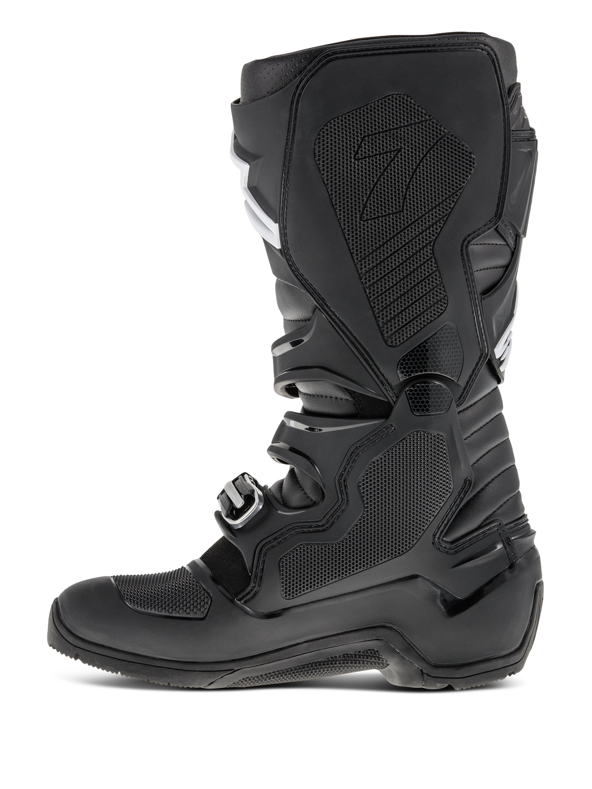Alpinestars Tech 7 Enduro Stiefel, Schwarz, Seitenansicht der medialen Seite mit Waben-Gummieinlage, TPU-Schutzpanelen und Schnallenverschlusssystem für Offroad-Motocross-Performance.