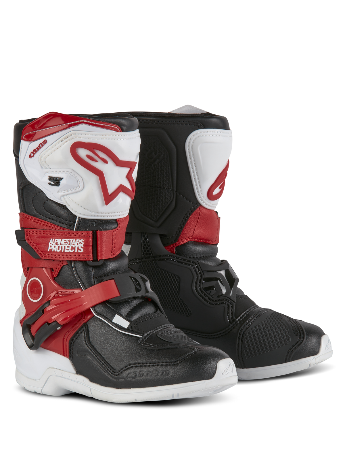 Alpinestars Kids Tech 3S Boots, Motocross Boots, White Black and Bright Red, featuring protective TPU shin plates, red straps with Alpinestars branding, buckle closure, and durable white outsoles.