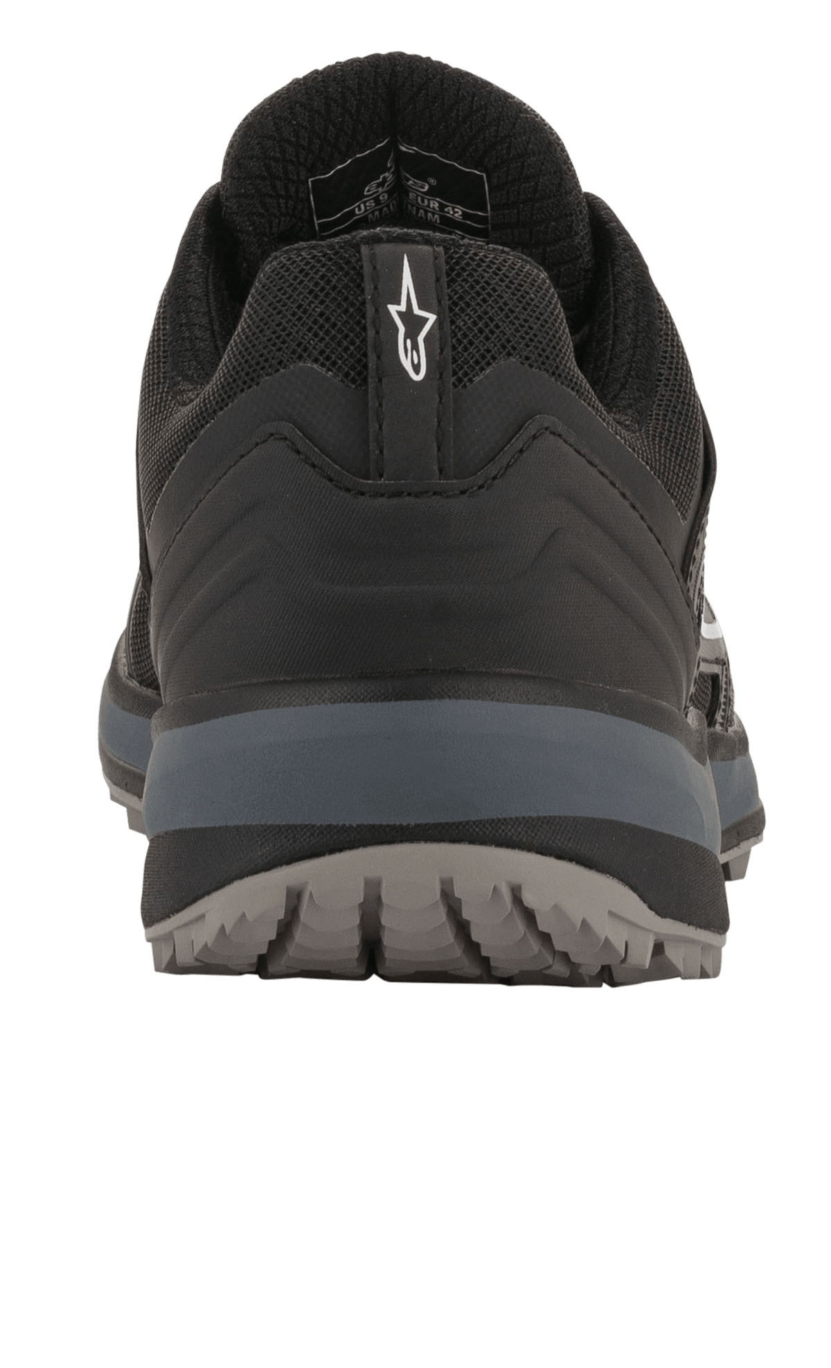Alpinestars Meta Trail Schuhe, Performance-Laufschuhe, Schwarz und Dunkelgrau, Rückansicht mit Fersenlasche und weißem Astar-Logo, dunkelgrauer Zwischensohle und profilierter Außensohle, lässiges vom Motorsport inspiriertes Schuhwerk für das Fahrerlager