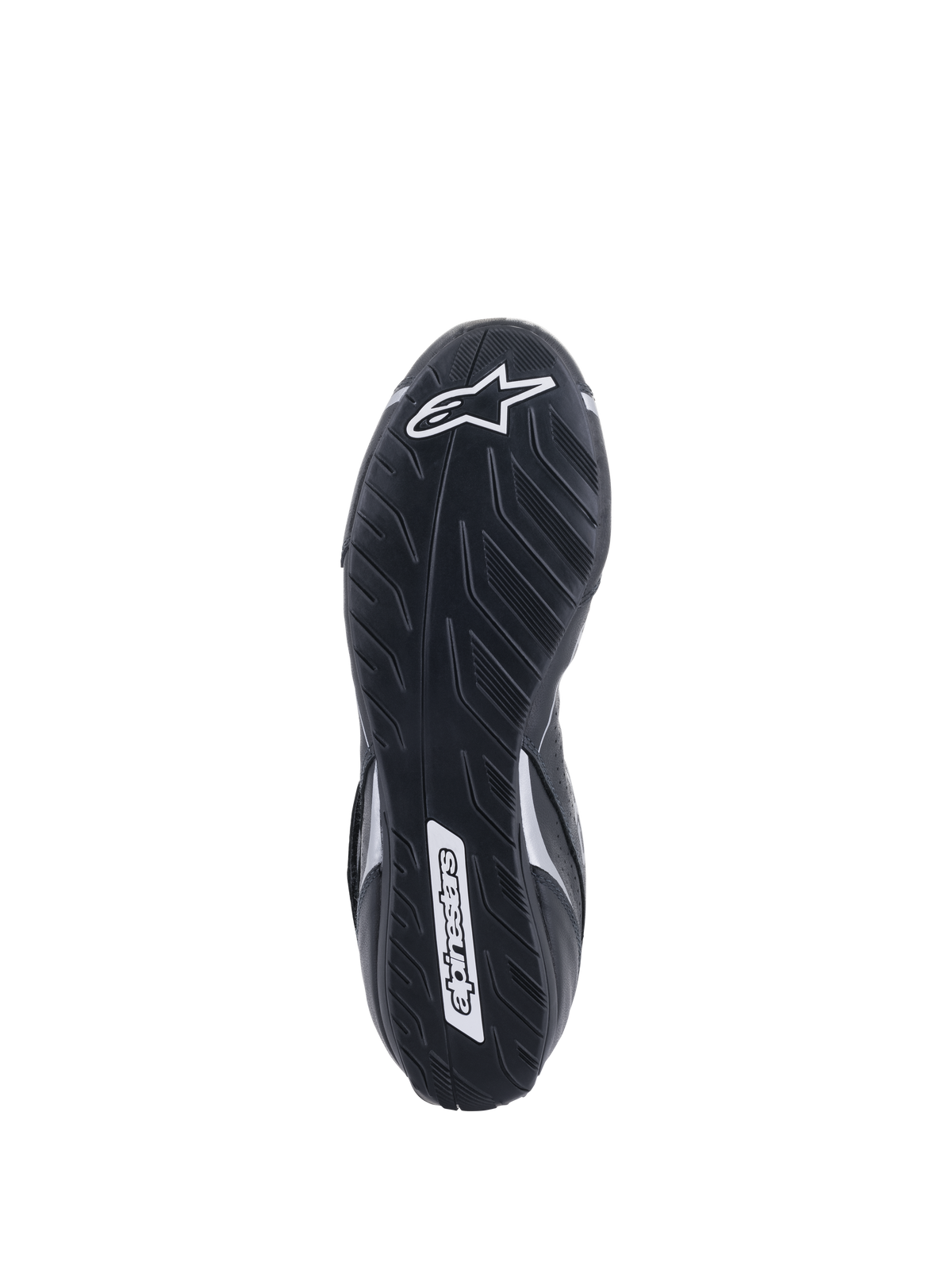 Alpinestars Tech-1 T V3 Schuhe FIA, Sohlenansicht, Schwarz und Silber, asymmetrische Gummiaußensohle mit Reifenprofil, weißes Alpinestars-Logo, dünne Gummimischung für optimale Pedalsensibilität