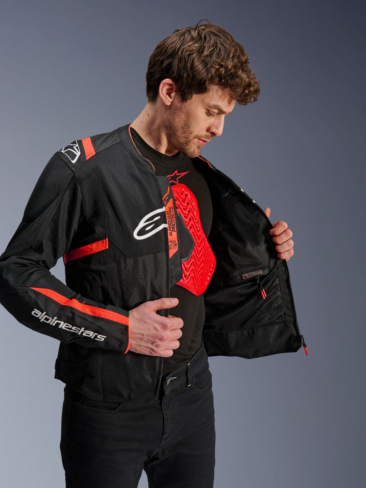 Alpinestars T-SPS Air V2 Jacke, Herren-Motorradjacke, Schwarz und Rot, mit Mesh-Futter und Nucleon Brustschutz.