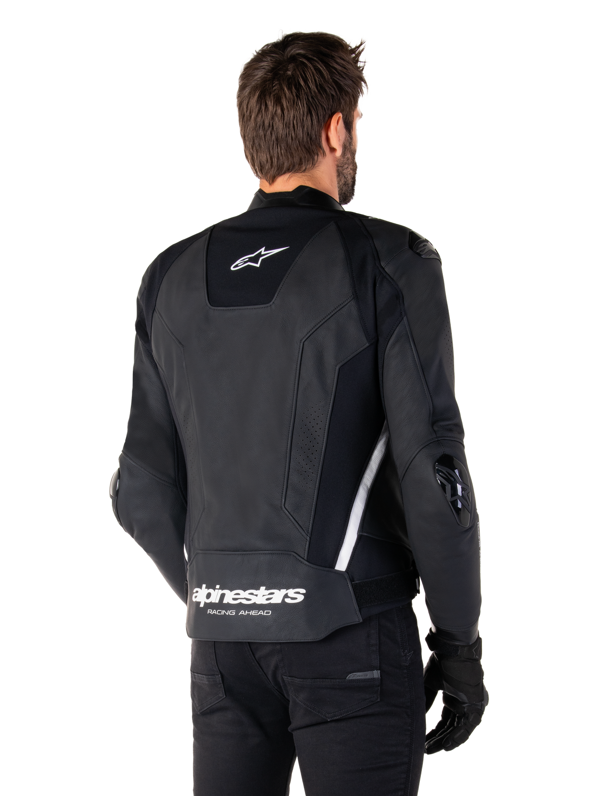 Alpinestars Missile V3 Lederjacke, Rückansicht, Schwarz und Weiß, mit Alpinestars Stern-Logo auf dem oberen Rücken und Wortmarke auf dem unteren Rücken, Schutz-Slider an Ellbogen und Schultern, Premium-Leder-Rennausrüstung