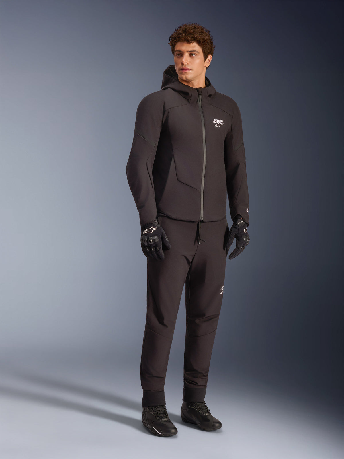 Alpinestars Aeroshell WP Jacke, wasserdichte Herren-Softshell-Kapuzenjacke in Schwarz, Textil, für Sport-Naked-Fahrten.