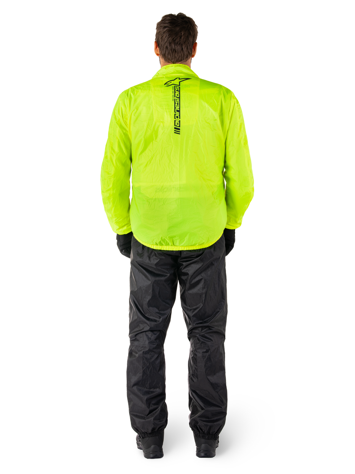Alpinestars Hurricane Rain V2 Jacke und Hose, wasserdichter Motorrad-Regenanzug, leuchtend neongelbe Jacke mit vertikalem schwarzem Branding auf dem Rücken, schwarze Hose, leichtes Textilmaterial für Schutz bei Fahrten unter nassen Wetterbedingungen