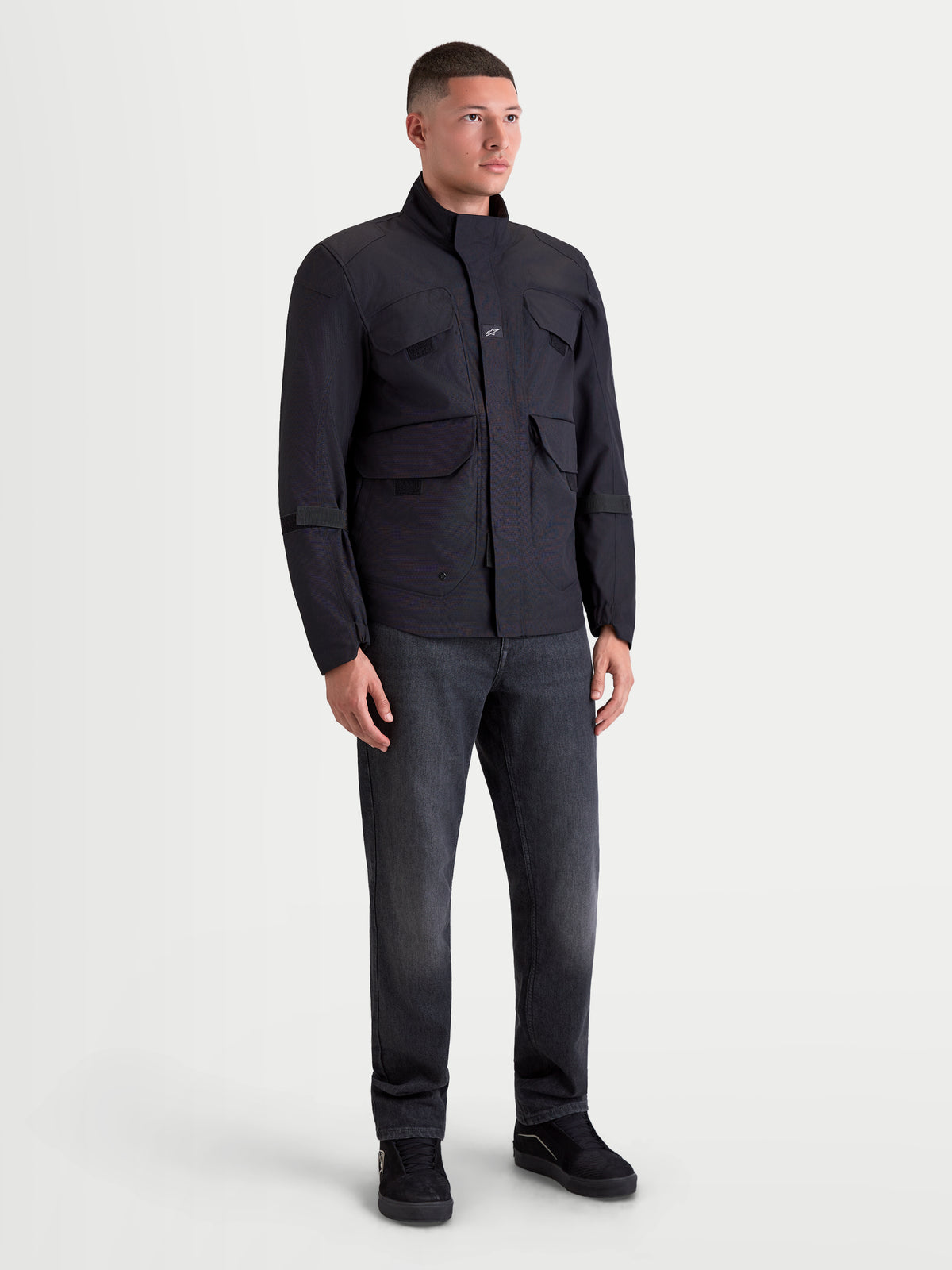 Alpinestars Altan Drystar Jacket, men's urban contemporary waterproof motorcycle jacket in black, field-jacket style worn by a model.