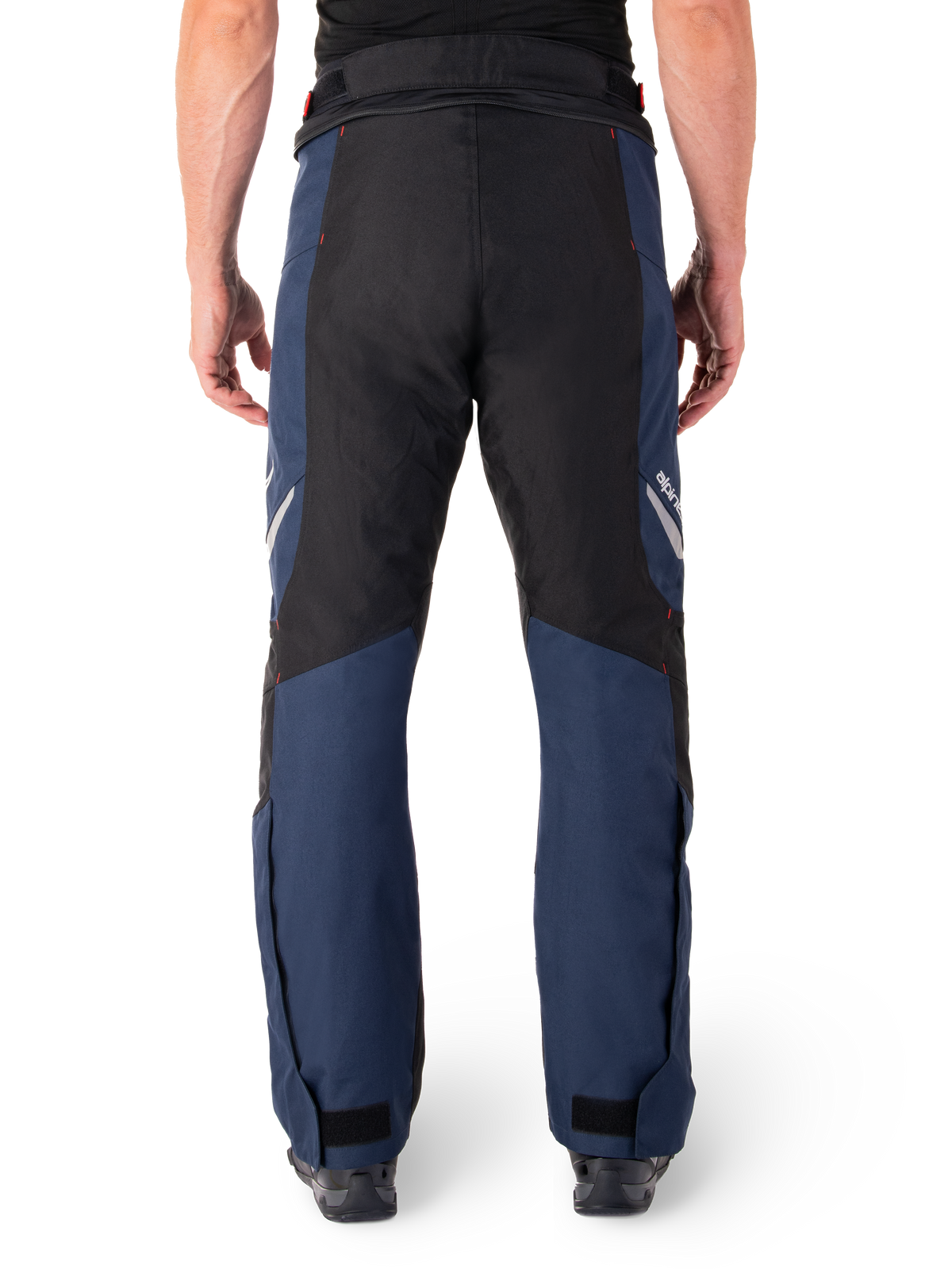 Alpinestars St-1 Waterproof Pants, Motorcycle Touring Pants, Dark Blue and Black with Bright Red accents, rear view, streamlined touring design featuring durable textile construction, reflective branding, and adjustable ankle closures.