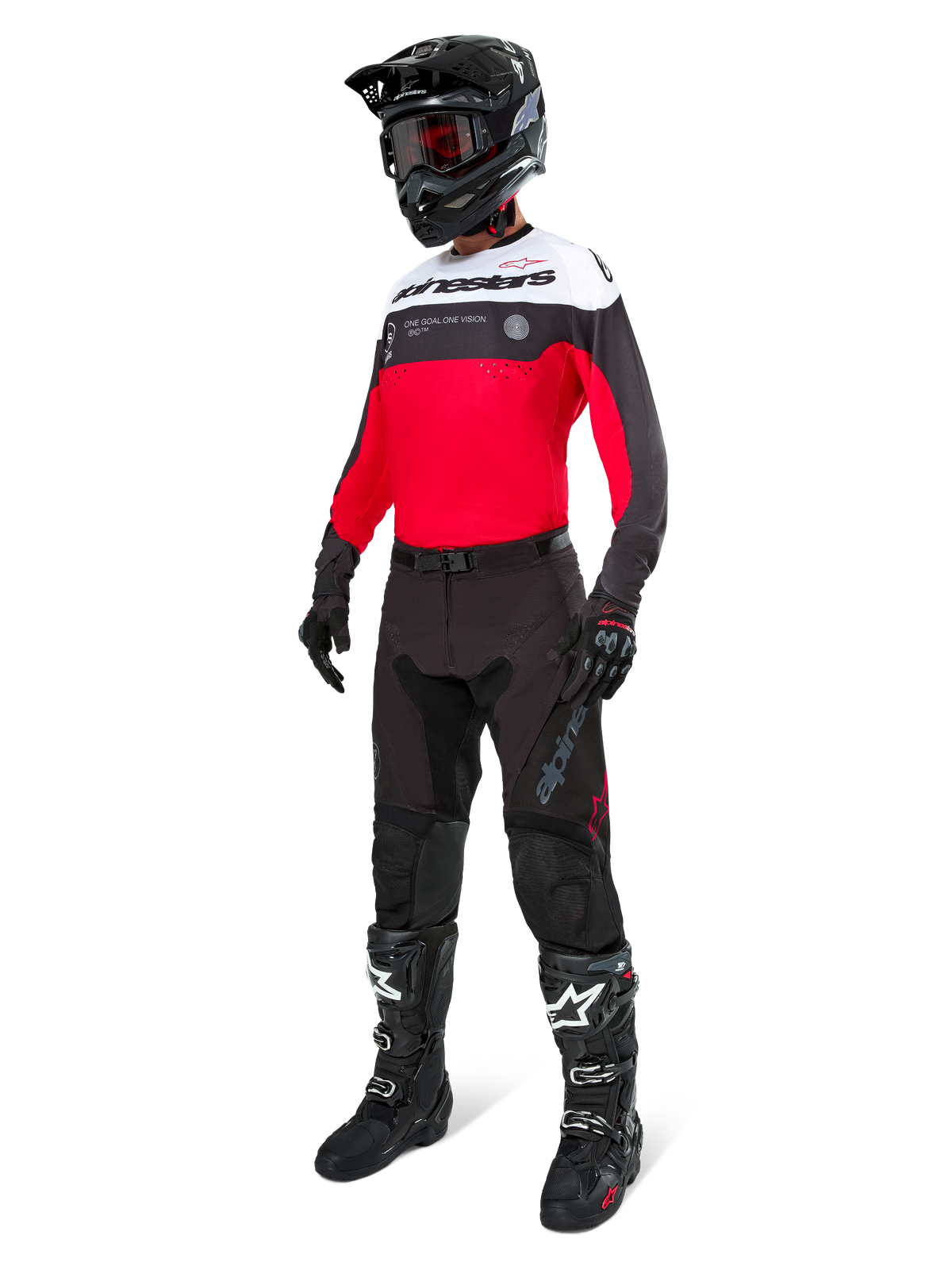 Alpinestars Pro-Dura Hose in Black Magnet White, getragen von einem Fahrer mit passendem rot-schwarz-weißem Trikot, schwarzem Helm und schwarzen Offroad-Stiefeln, komplettes professionelles Enduro-Rennsport-Ausrüstungsset für Offroad-Performance.