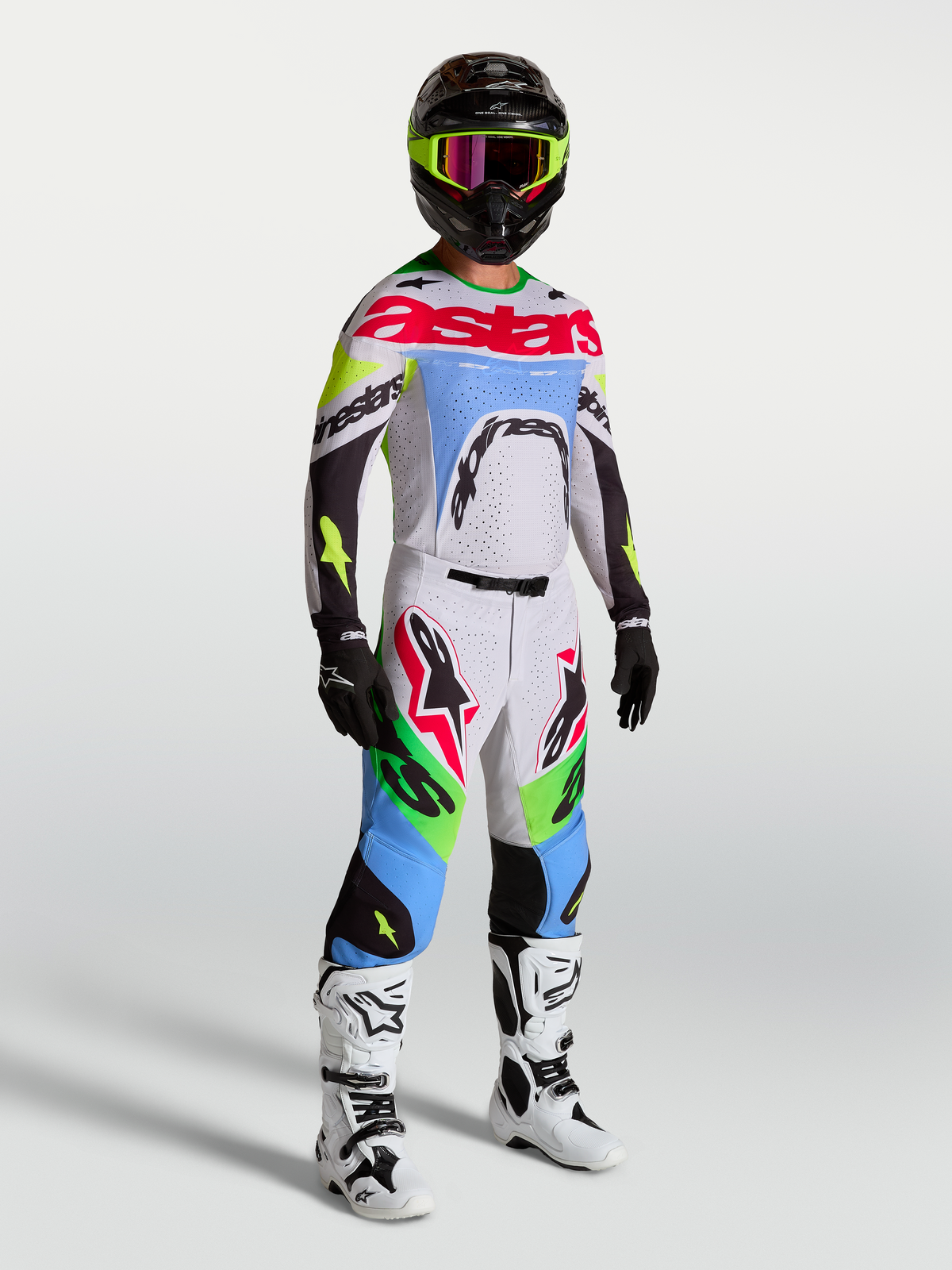 Alpinestars Supertech Dyna Hose, Herren-Motocross-Hose, Helllila und fluoreszierendes Grün, Teil einer kompletten Rennkombi.