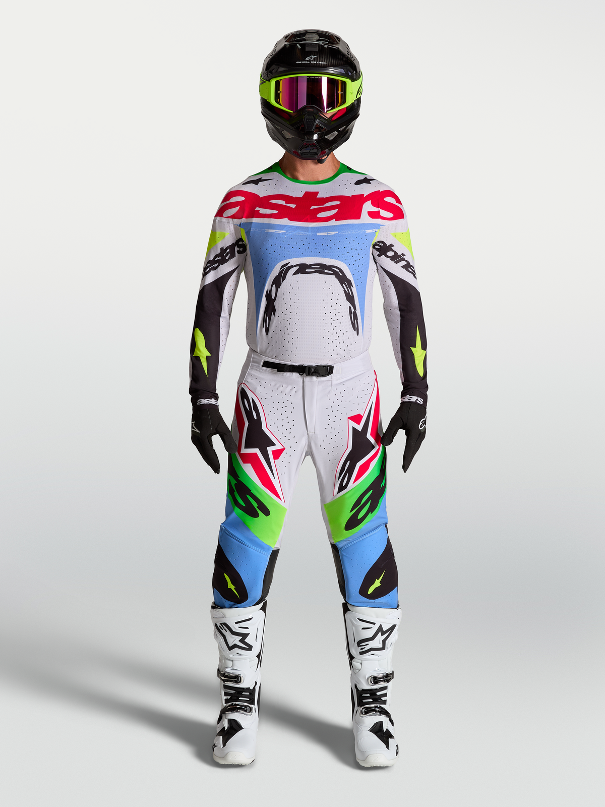Alpinestars Supertech Dyna Hose, Motocross-Hose, Hell-Lila und Neongrün, aus Stretch-Ripstop-Gewebe mit Rennpassform.
