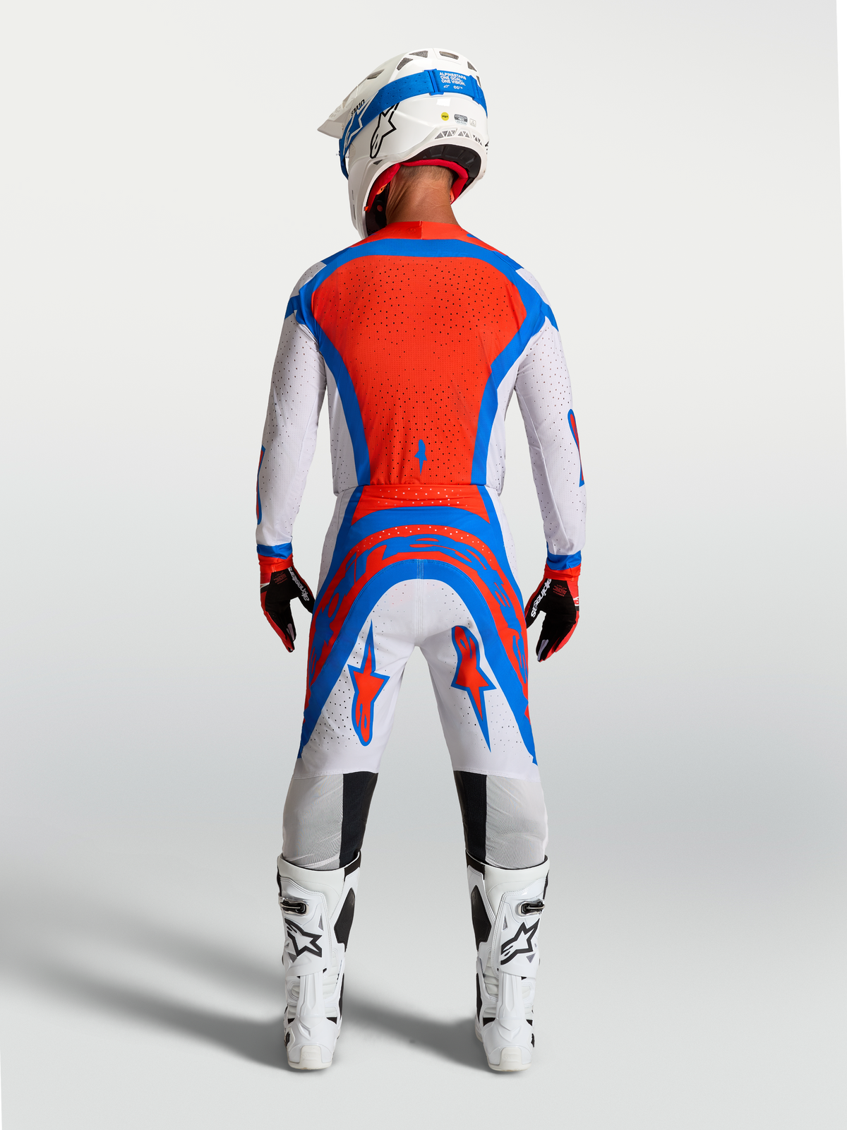 Alpinestars Supertech Vesta Hose, Motocross-Hose für Herren in Helllila und Rot, athletische Rennpassform in der Rückansicht.