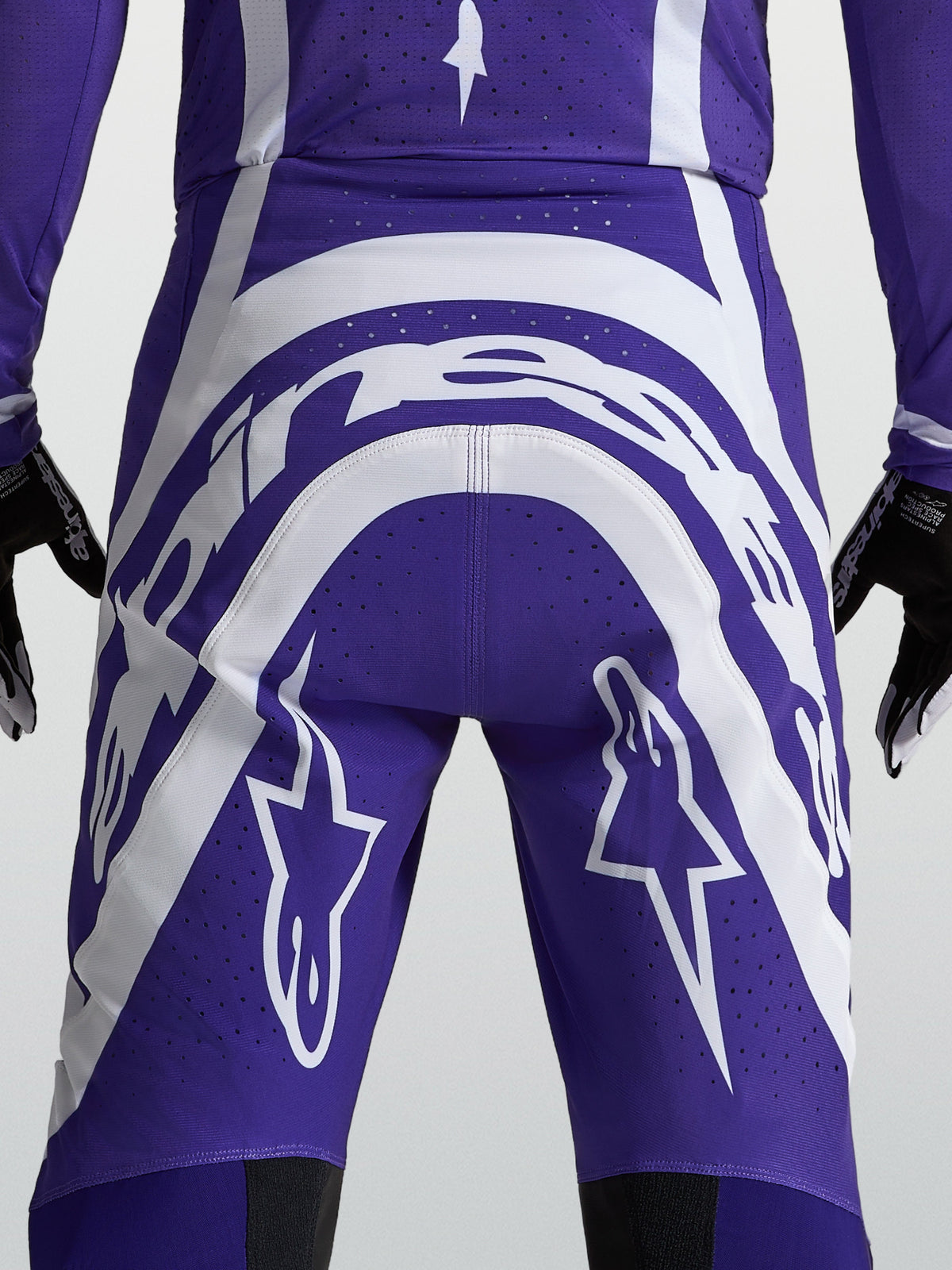 Alpinestars Supertech Vesta Hose, Motocross-Rennsport, Herren, Dunkelblau und Weiß, Rückansicht mit Logo und Perforationen.