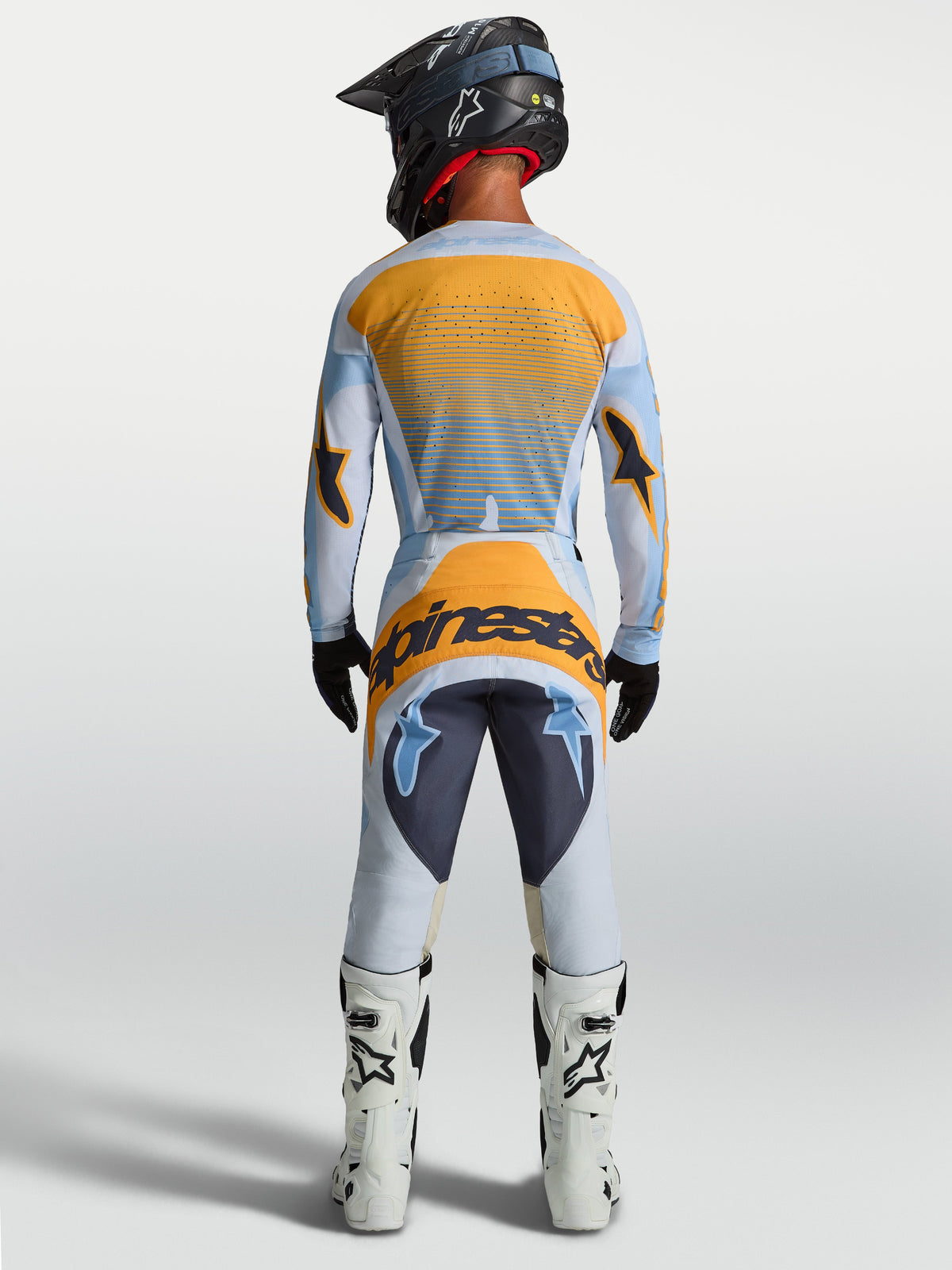 Alpinestars Techstar Maven Pants, men's motocross pants in dust blue and tangerine, featuring a reinforced seat, ergonomic race fit, and durable stretch construction.