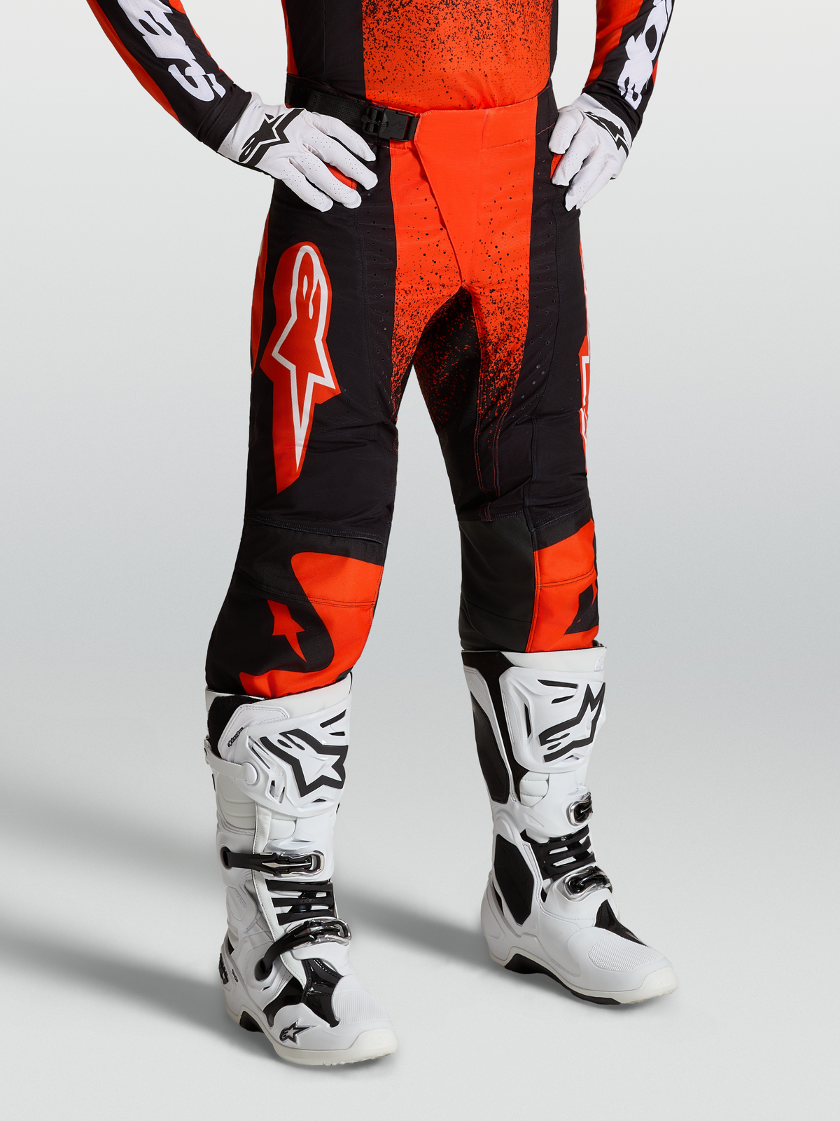 Alpinestars Techstar Swan Pants, Motocross Racing Pants for Men, Cardinal Red and Black, durable ripstop with 4-way stretch panels.