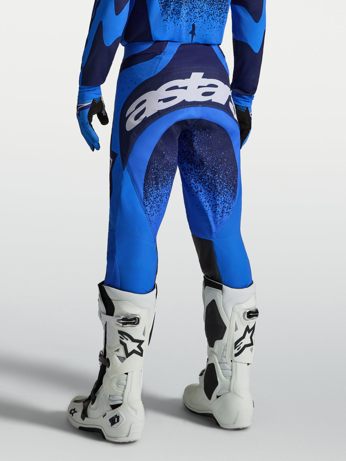 Alpinestars Techstar Swan Pants, Motocross Racing Pants for Men, Ucla Blue and Deep Blue, with large white seat logo.