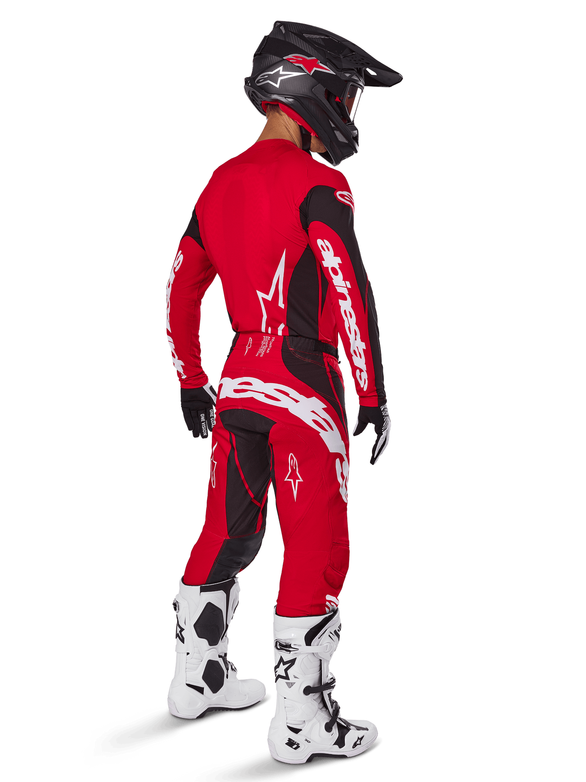 Alpinestars 2025 Techstar Dreem Hose, Motocross-Hose, Hellrot und Schwarz, von einem Fahrer aus der Rückansicht in kompletter Rennausrüstung getragen, mit passendem rotem Trikot, schwarzem Helm und weißen Stiefeln, markantes weißes Alpinestars-Branding und schwarze Stretch-Einsätze.