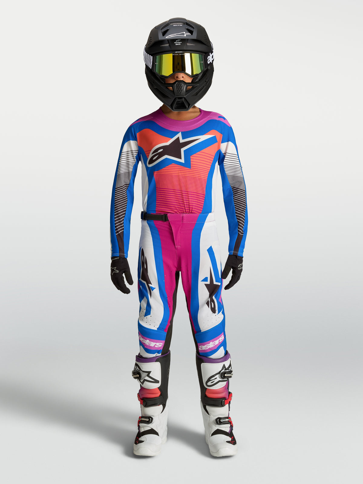 Alpinestars Youth Supertech Maven Pants, Motocross Gear in White, Hot Coral and Blithe Blue, for young competitive riders.