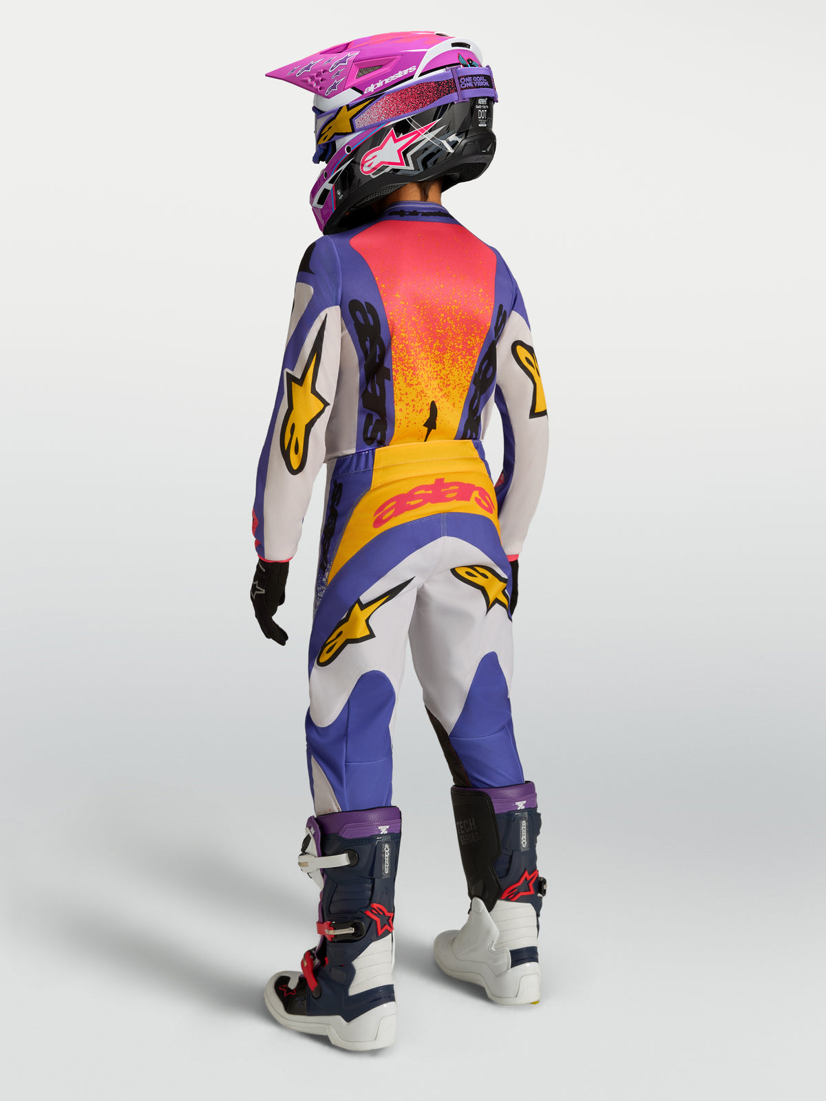 Alpinestars Fluid Drag Jugend-Hose, Motocross-Hose in Blau und Gold, Rückansicht mit strapazierfähigem Polygewebe und ergonomischer Passform.