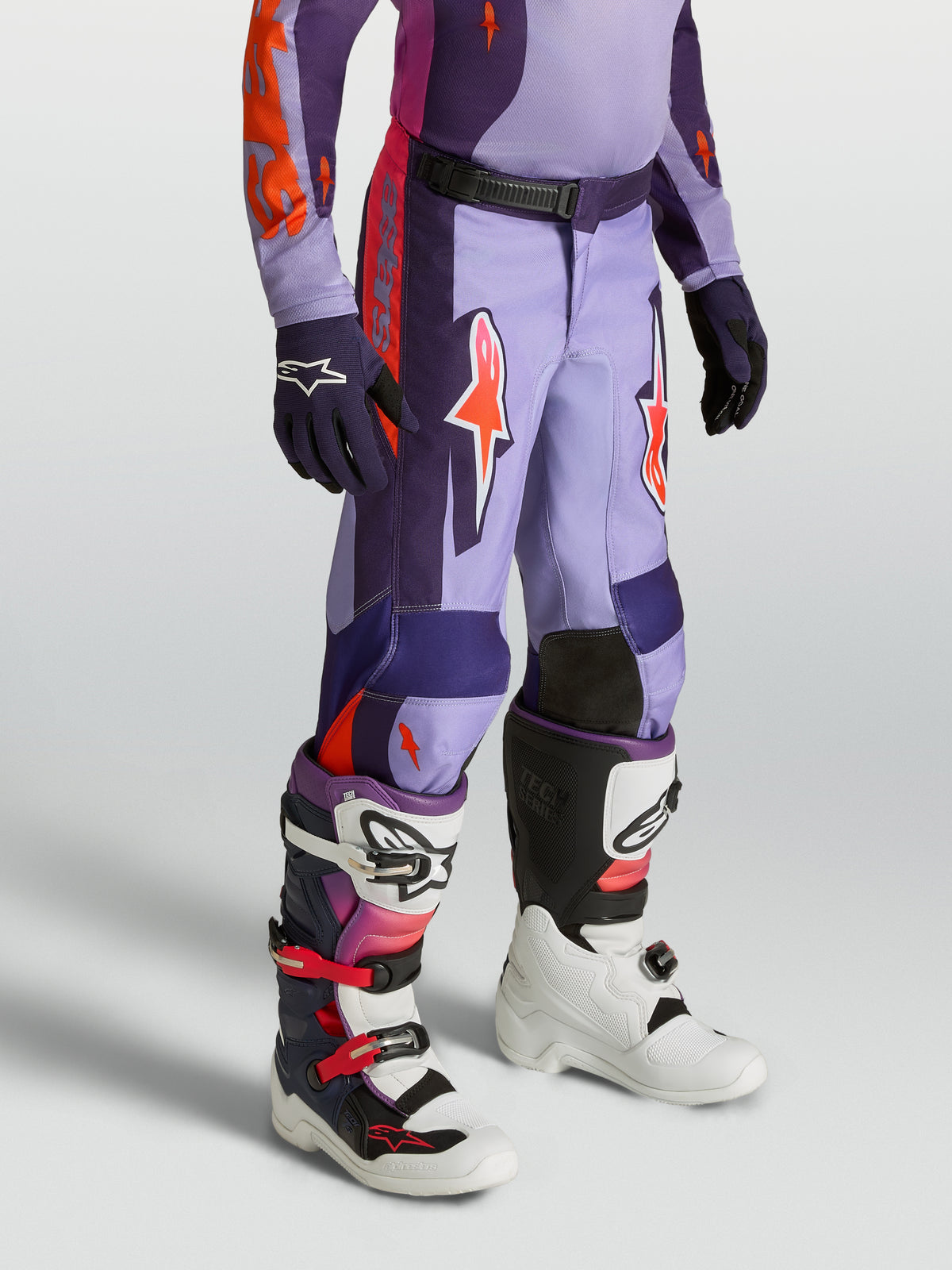 Alpinestars Youth Fluid Hunt Pants, durable purple and pink motocross pants with an ergonomic sport fit.