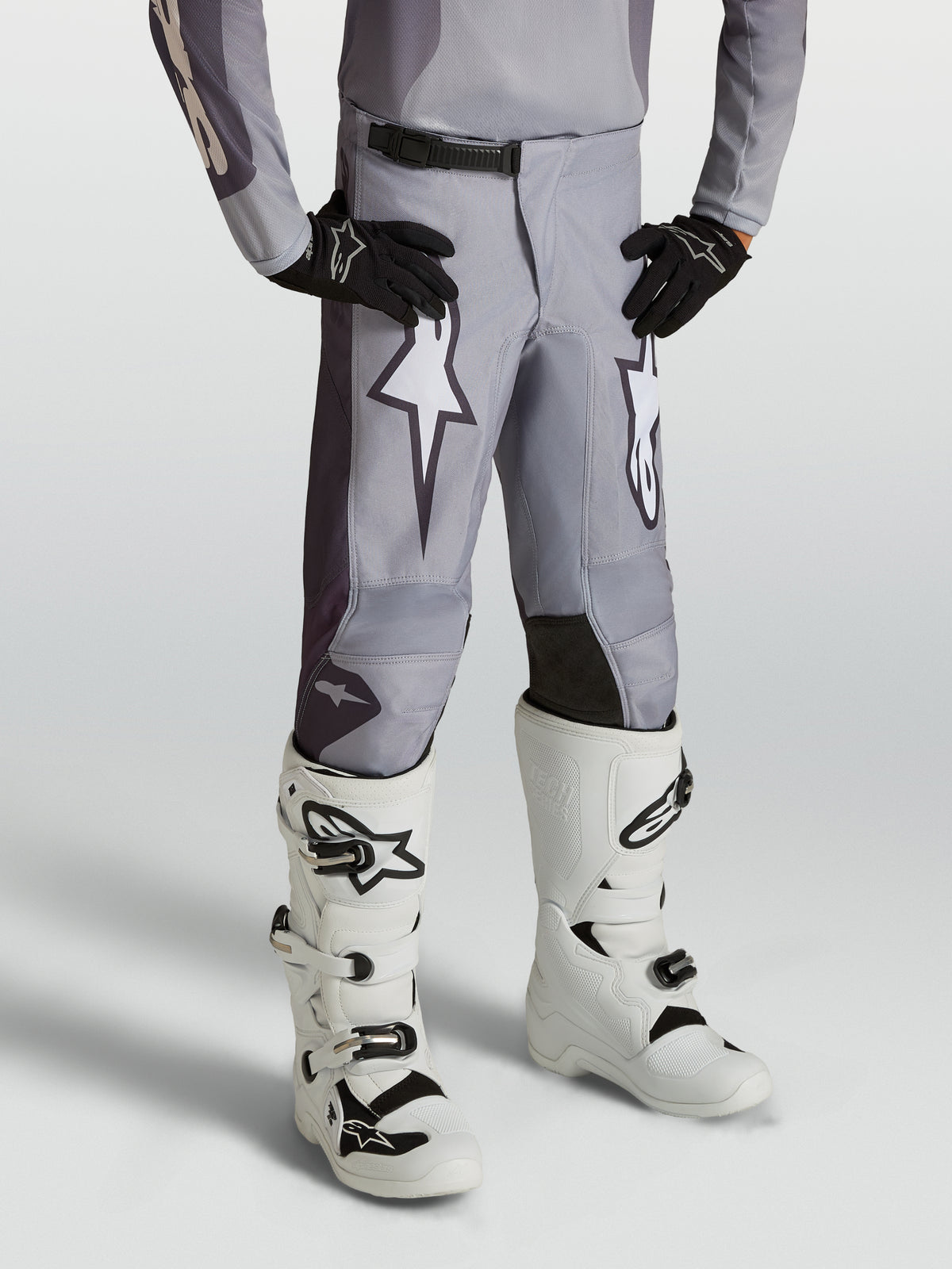 Alpinestars Youth Fluid Amber Pants, sand gray youth motocross pants with white star graphics and reinforced panels.