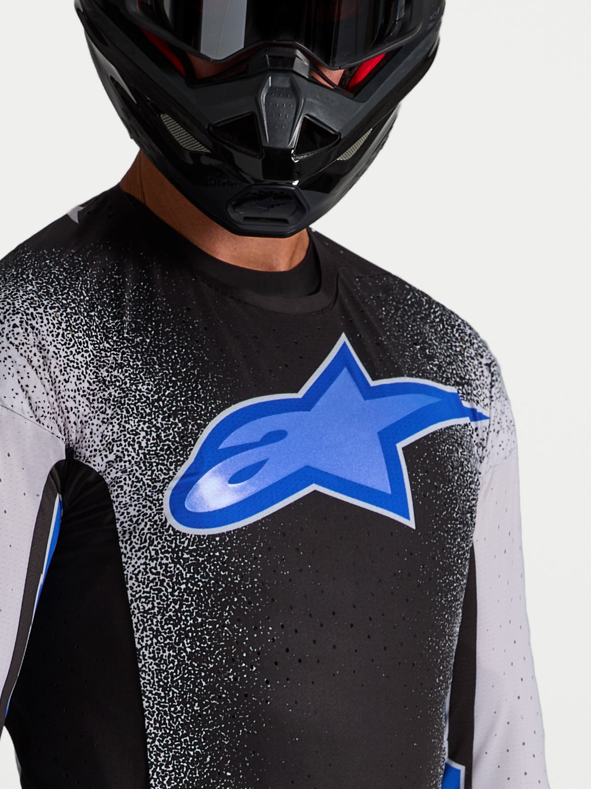 Alpinestars Supertech Hiten AFD Trikot, Herren-Motocross-Renntrikot, Schwarz-Blau, mit lasergefertigten Belüftungsöffnungen.