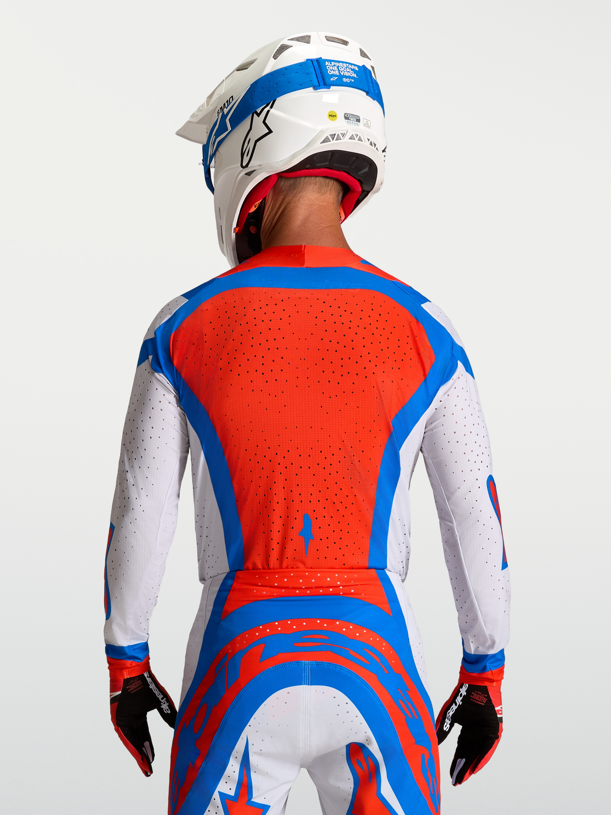 Alpinestars Supertech Vesta Trikot in Rot und Weiß, mit belüftetem Mesh-Rücken für professionellen Motocross-Sport.