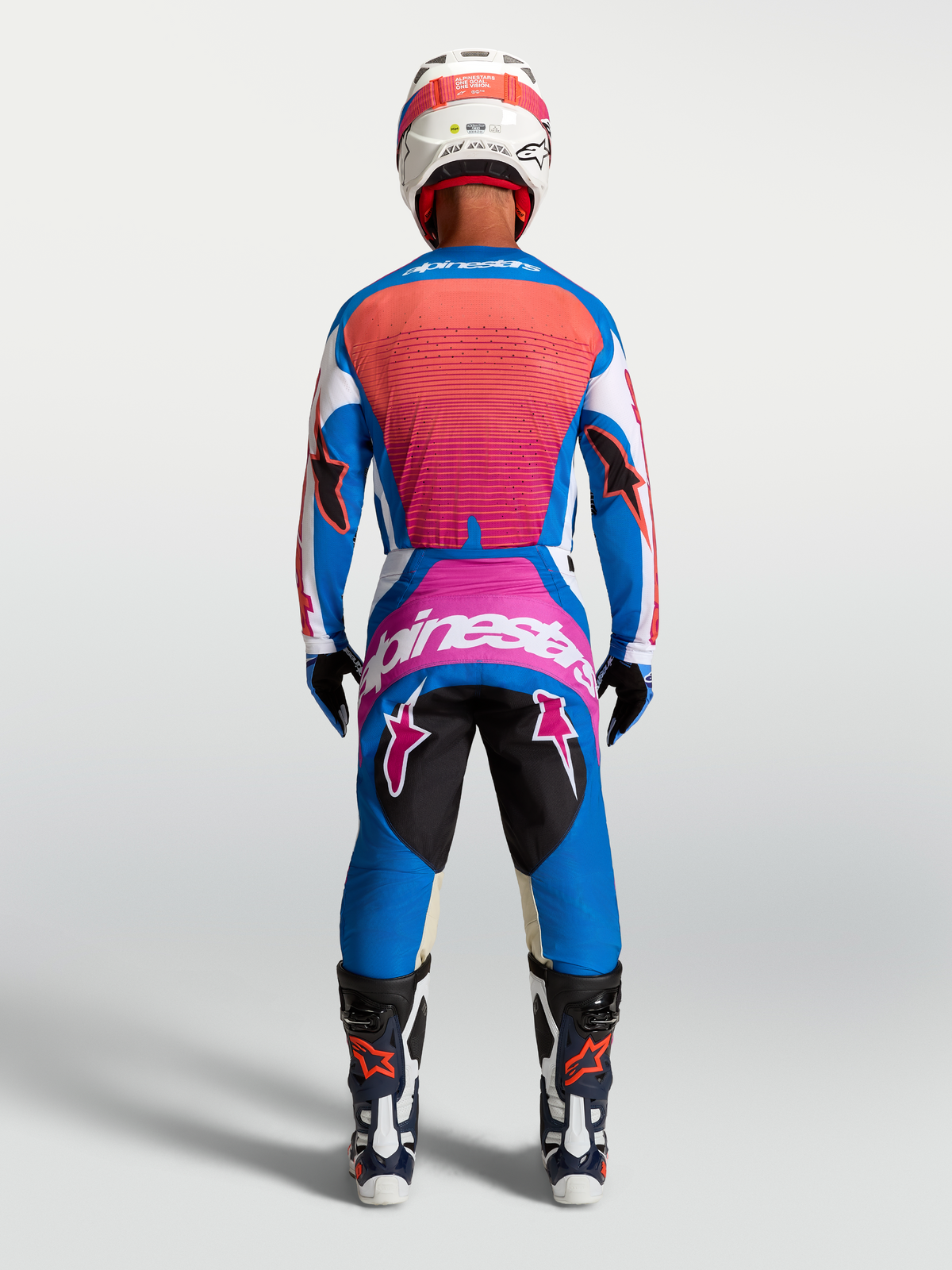 Alpinestars Techstar Maven Trikot und Gear Set, Motocross-Renngewand in Blau und Hot Coral, Rückansicht.