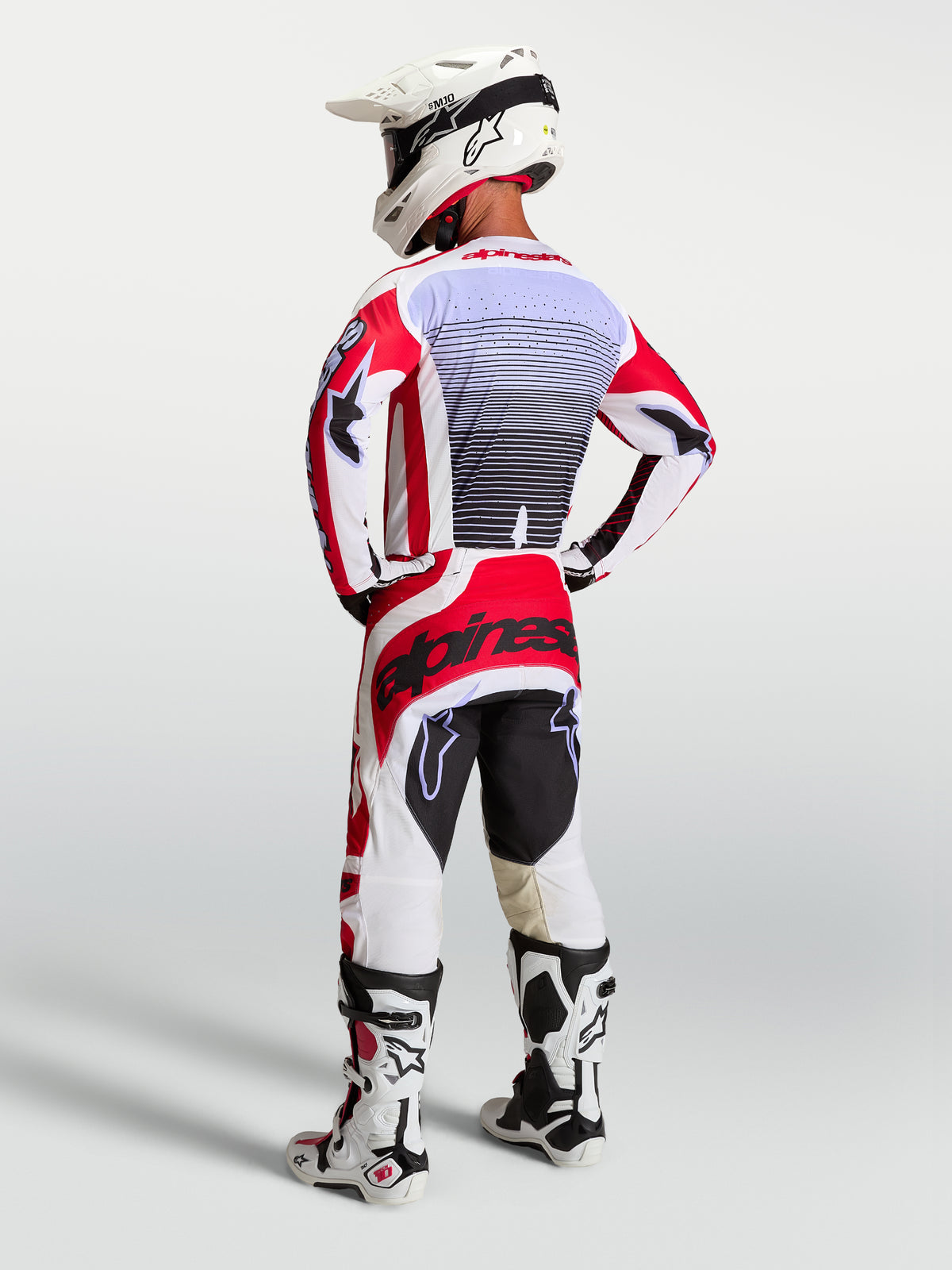 Alpinestars Techstar Maven Trikot, Motocross-Herrenbekleidung, Rot und Weiß, Rückansicht, lila Akzente, Race-Passform.