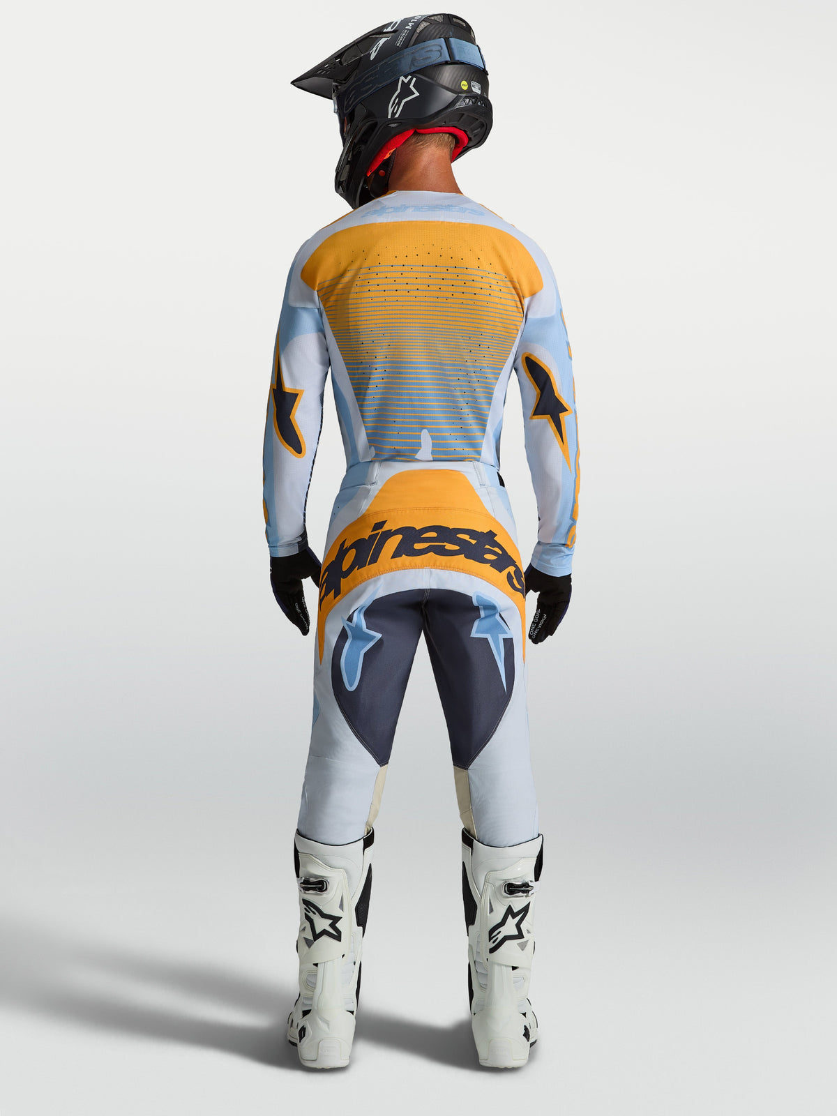 Alpinestars Techstar Maven Trikot und Ausrüstungsset, Motocross-Racing, Herren, Staubblau und Orange, Rückansicht.