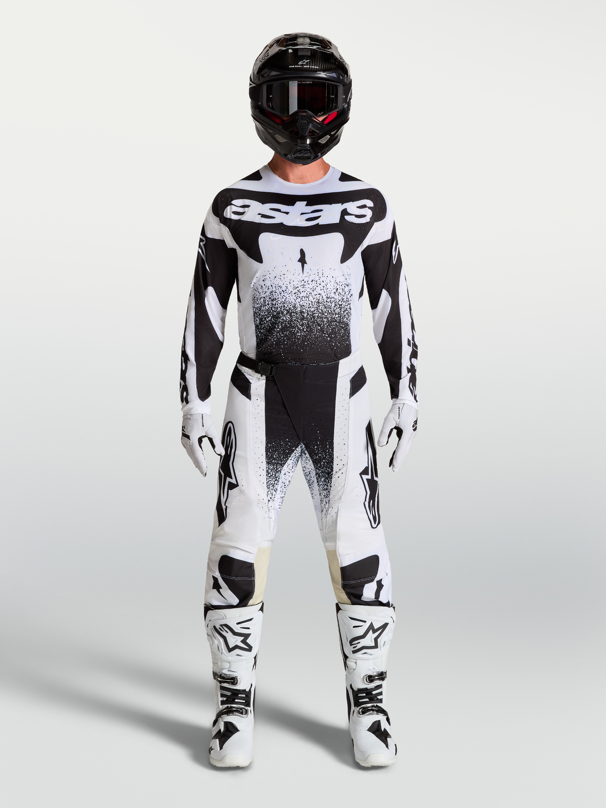 Alpinestars Techstar Swan Trikot und Gear Set, Herren-Motocross-Outfit, Schwarz und Weiß mit punktierten Grafiken.