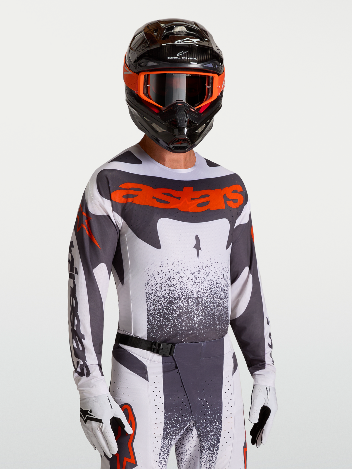 Alpinestars Techstar Swan Trikot, Motocross-Oberteil in Grau und Rot Fluo, mit Race-Fit und lasergeschnittener Belüftung.