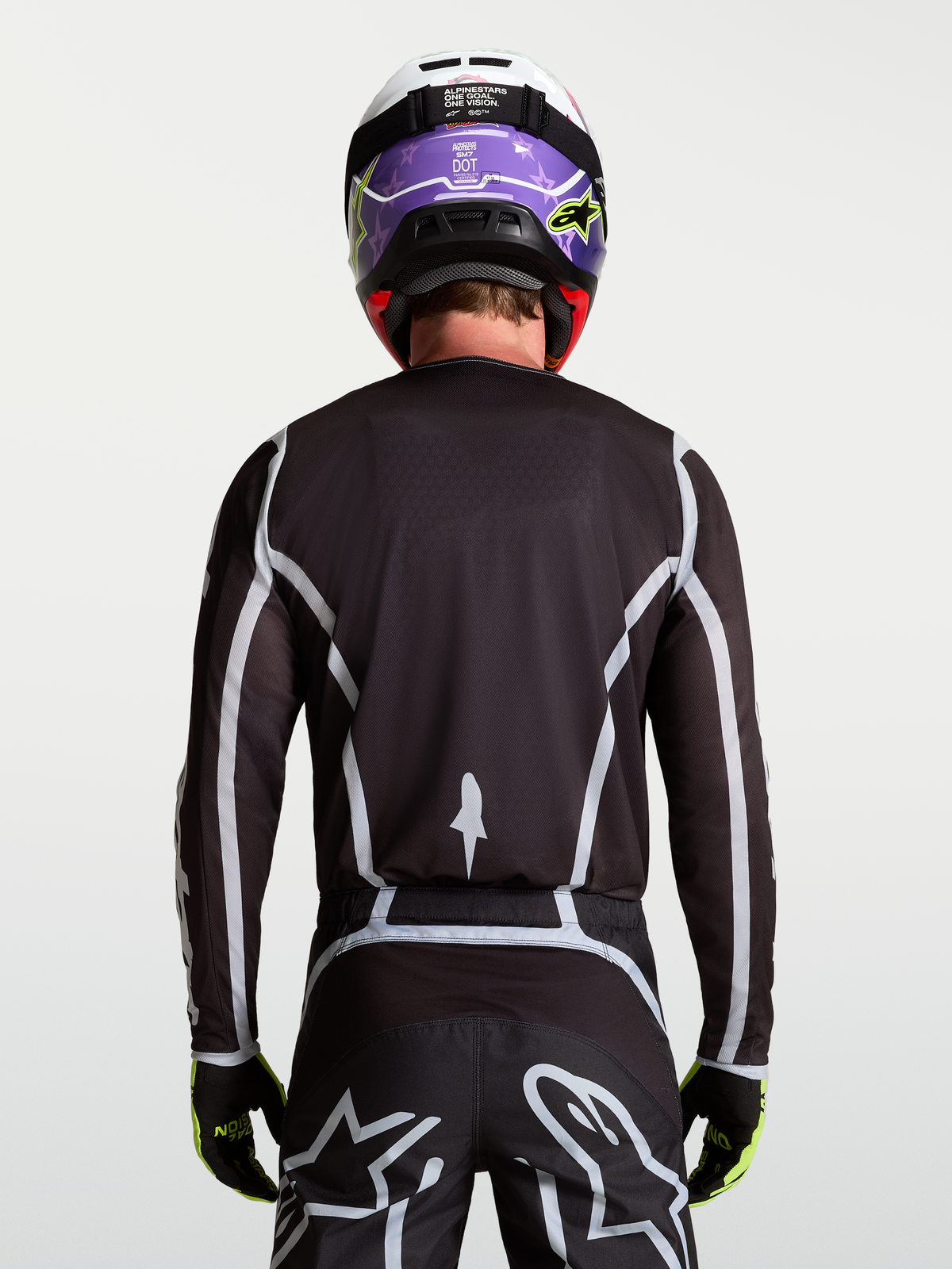Alpinestars Fluid Apex V2 Trikot, Herren-Motocross-Trikot, Schwarz und Silber, R%fcckansicht mit ergonomischer Passform.
