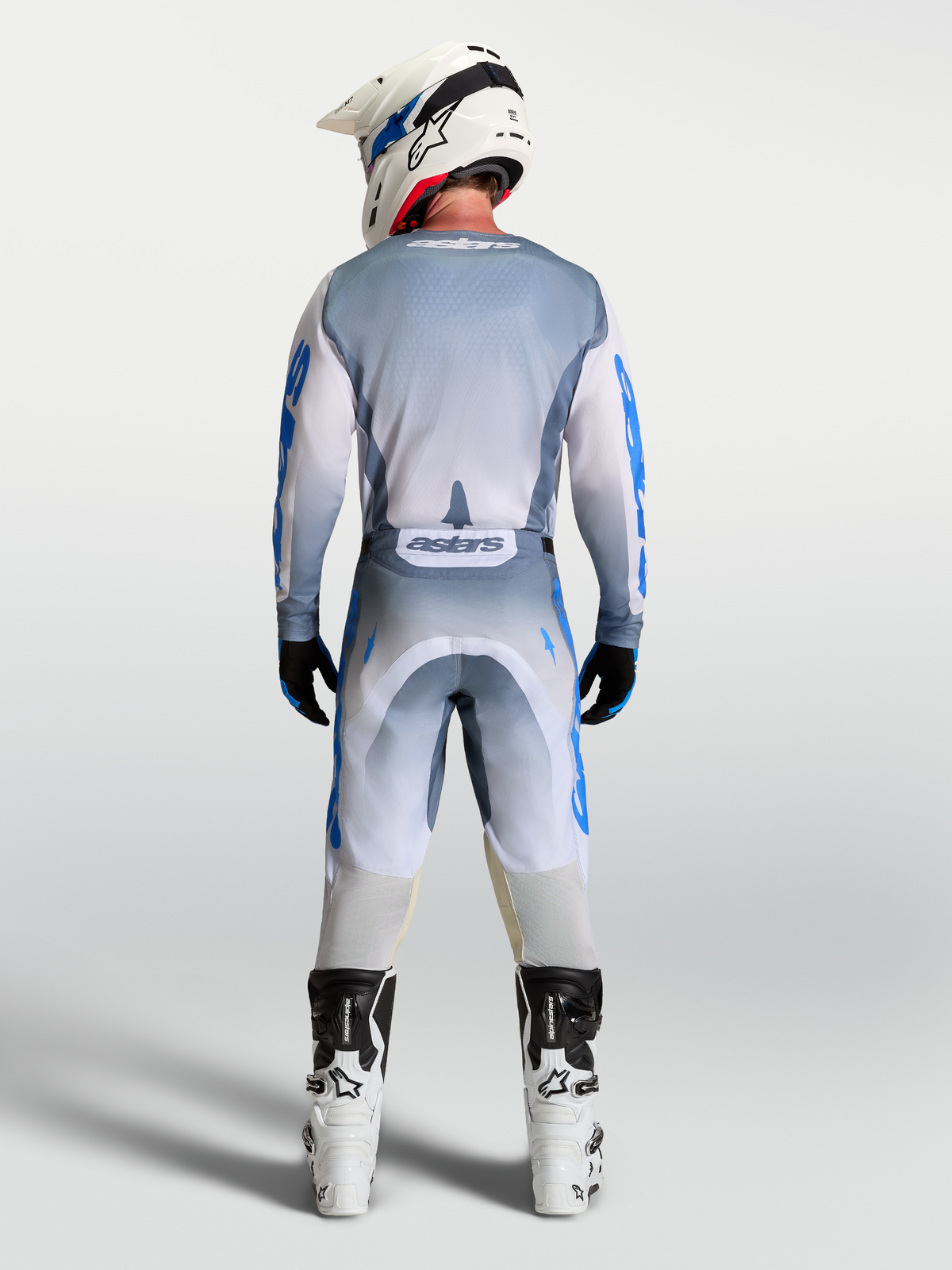 Alpinestars Racer Amber Hose und Gear Set, Herren-Motocross-Outfit in Aschgrau und UCLA-Blau, Rückansicht.