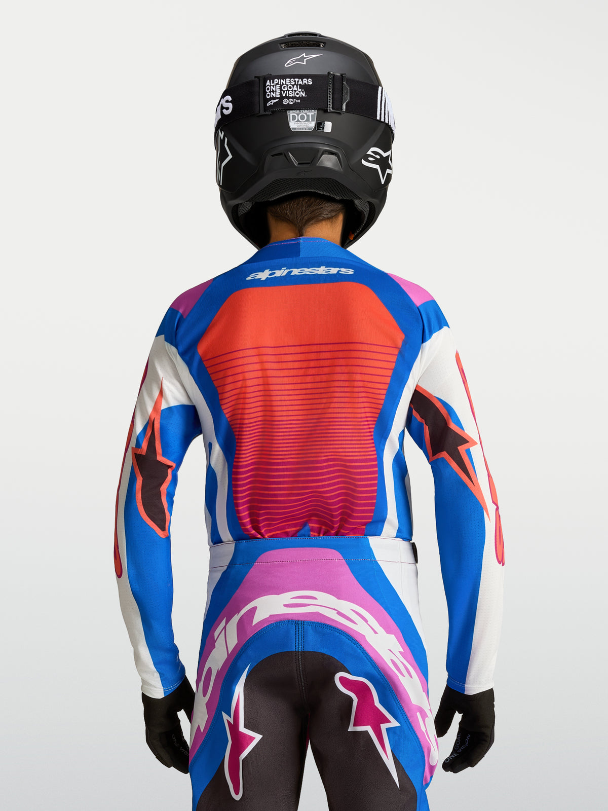 Alpinestars Youth Supertech Maven Jersey, blue and coral motocross shirt with breathable mesh panels, rear view.