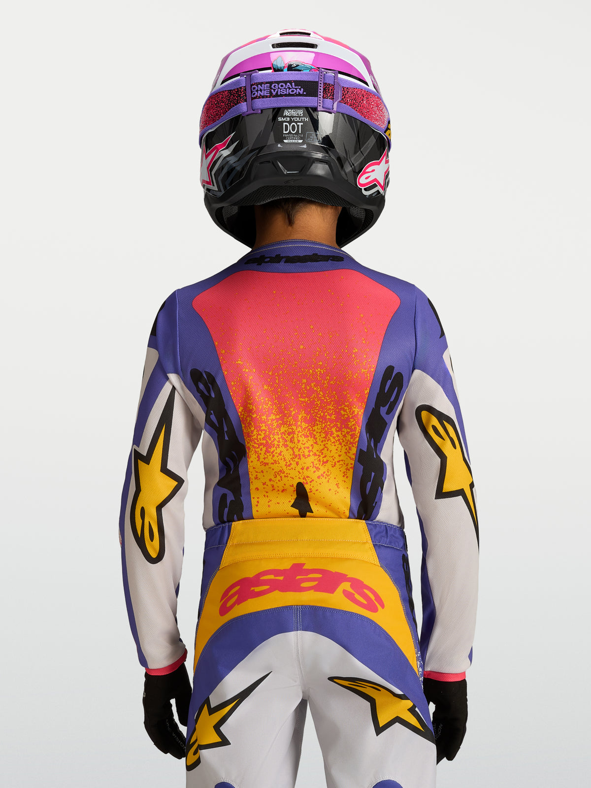 Alpinestars Fluid Jugend-Trikot Drag 2027, Motocross-Trikot für Kinder, Blau und Gelb, Rückansicht mit renninspirierten Grafiken aus atmungsaktivem Polygewebe.