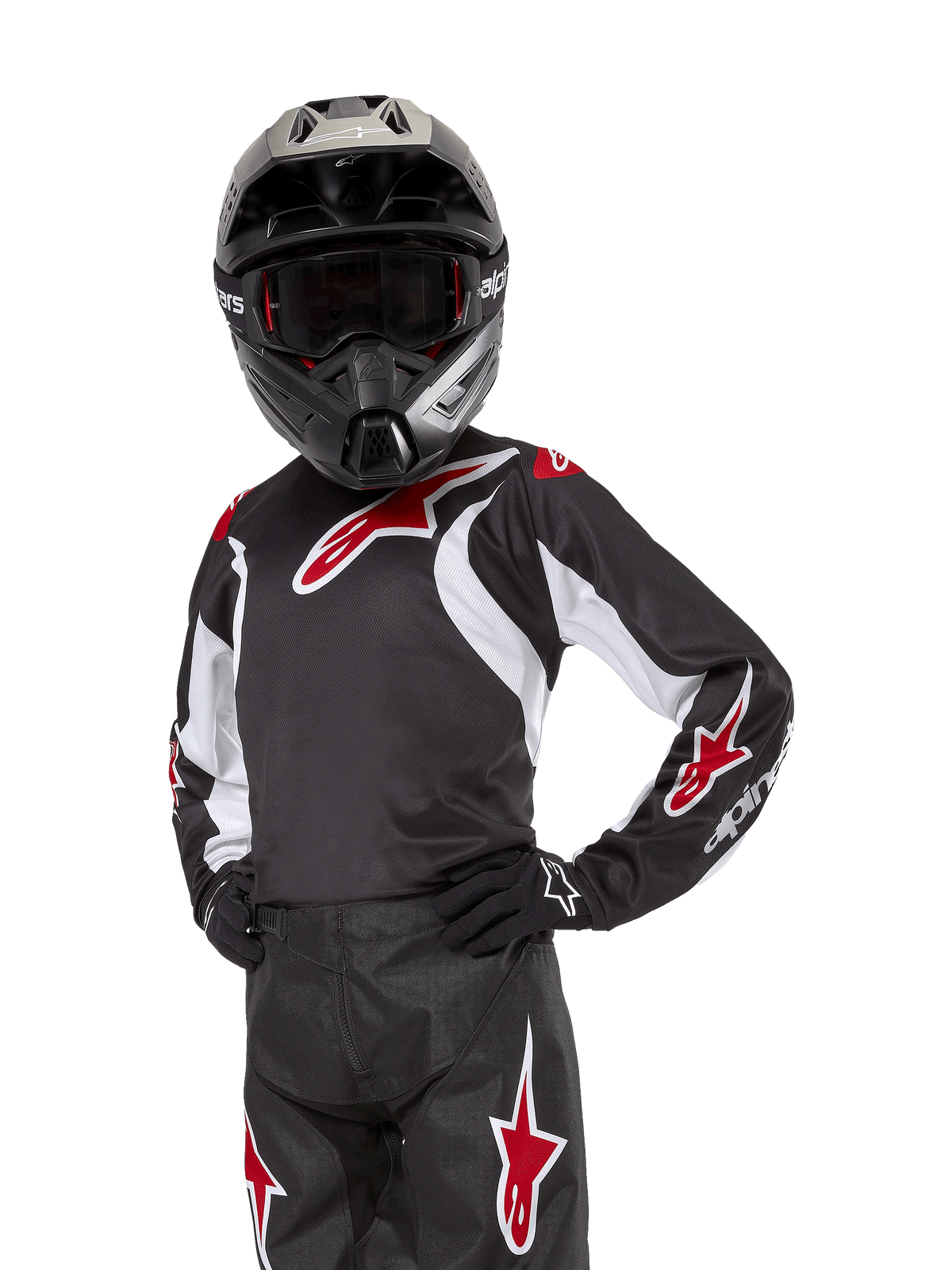 Youth 2024 Racer Lucent Jersey, Motocross Jersey, Black White and Red, worn by a youth rider with a black helmet and matching pants, featuring red star logos and white graphic accents, performance off-road apparel for dirt bike racing