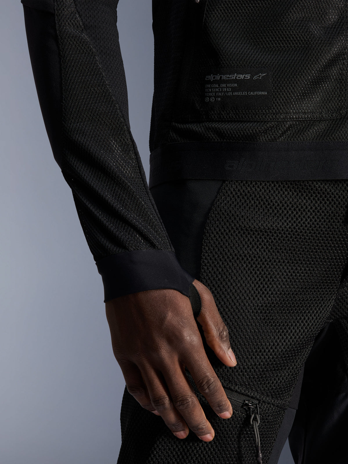 Alpinestars Troop-Air Jacket, black urban summer motorcycle jacket with technical mesh and thumb-hole loops.