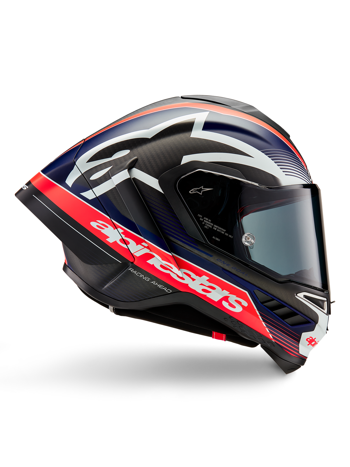 Alpinestars Supertech R10 Team Helm, Motorradrennhelm, Carbon-Schwarz mit Akzenten in Fluo-Rot und Matt-Blau, mit großem weißem Alpinestars-Logo, aerodynamisches Design mit integrierten Spoilern, klares Visier, sichtbare Carbonfaser-Struktur, schlankes Rennprofil