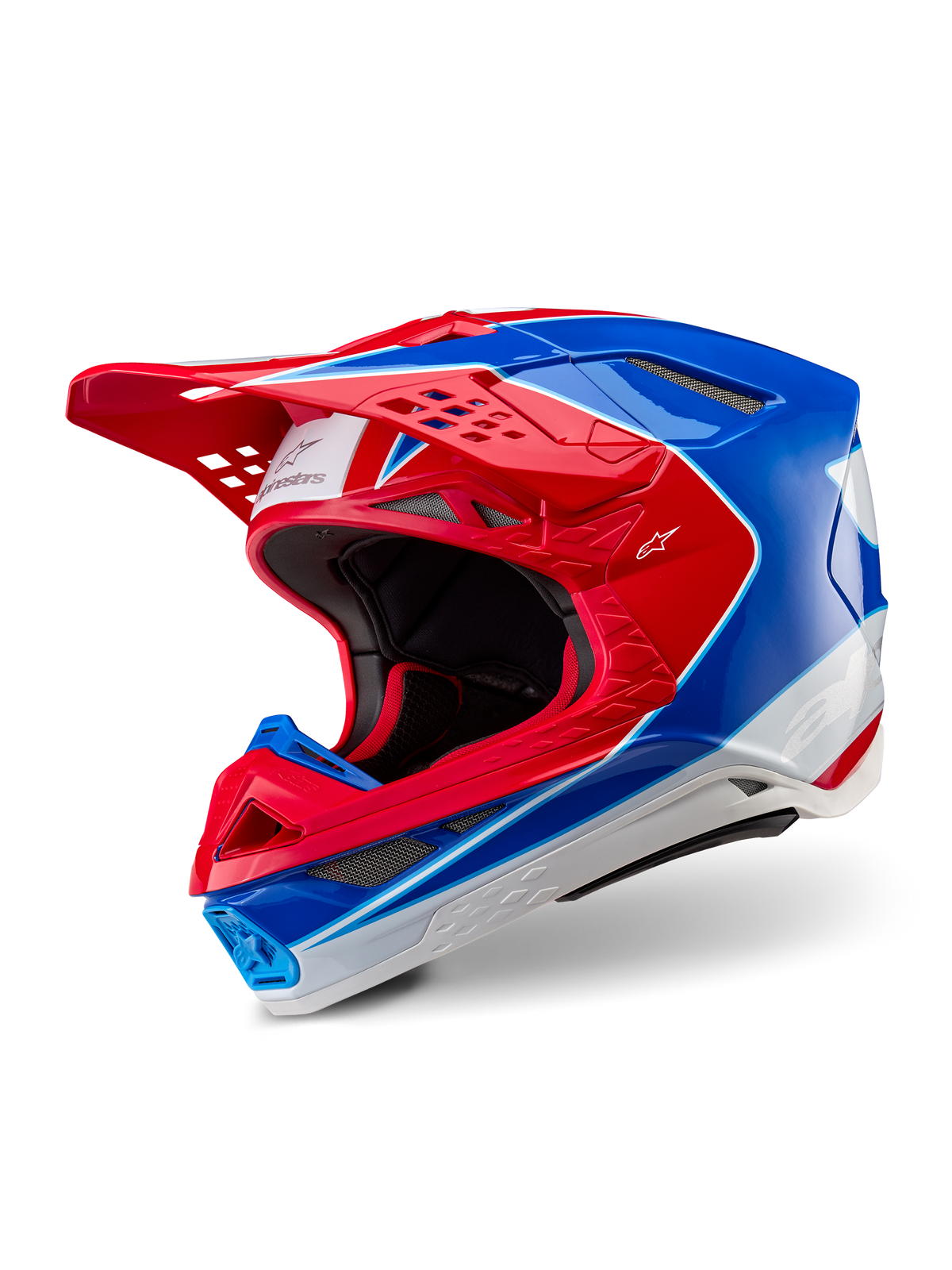 Alpinestars Supertech M10 Aeon Helm, Motocross-Helm, Hellrot-Blau Glänzend, Dreiviertelansicht mit aerodynamischer Schale und mehreren Belüftungsöffnungen, weiße und rote grafische Akzente, Alpinestars-Logo auf Visier und Seite, professionelle Offroad-Rennausrüstung