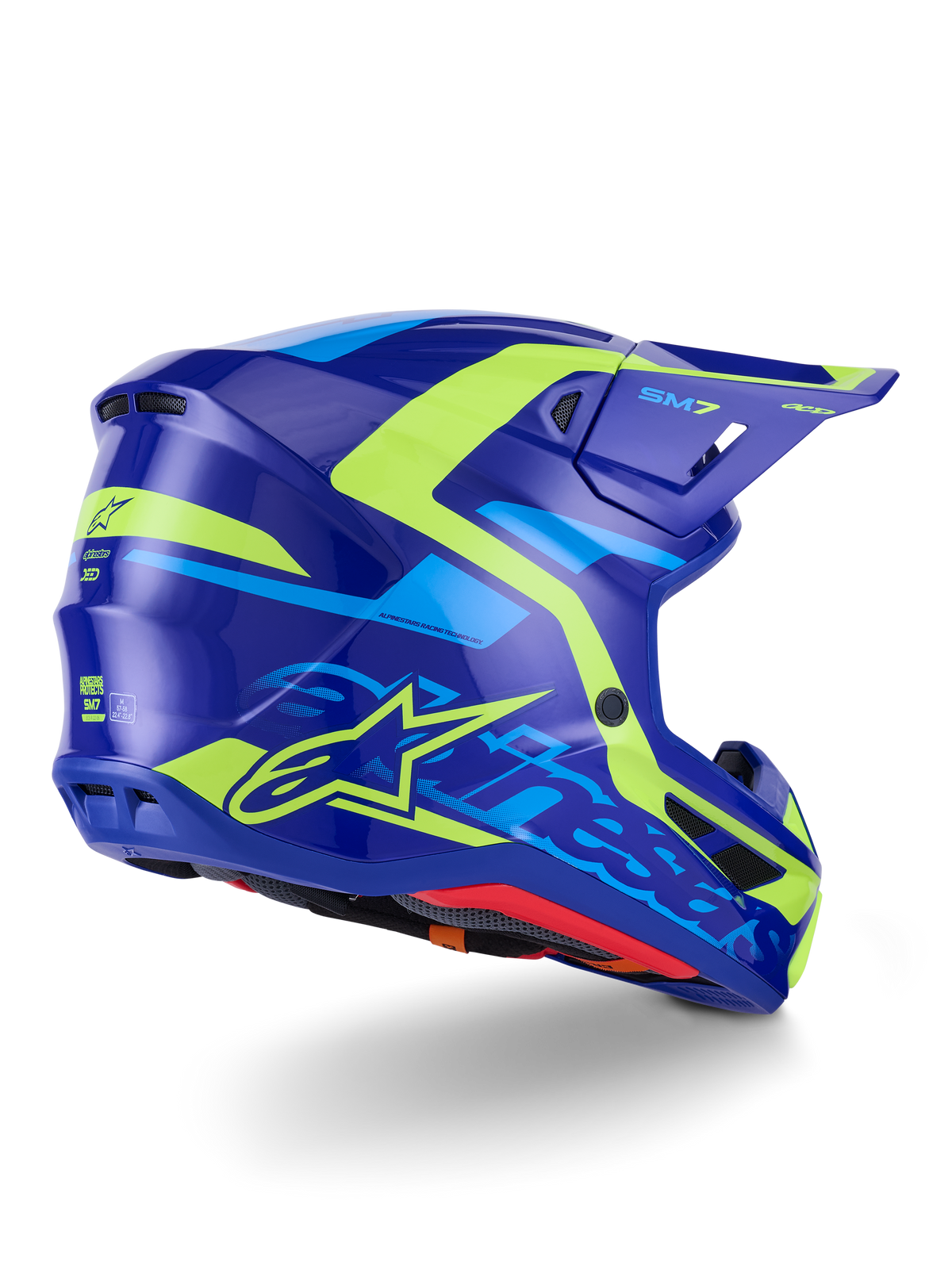 Alpinestars S-M7 Deed Helm ECE 22.06, Motocross-Helm, Blau Gelb Fluo Glänzend, Seiten-Rückansicht mit schlankem aerodynamischem Schalenprofil, markantes Alpinestars-Branding mit leuchtend neongelben Akzenten, Hochleistungs-Belüftungsöffnungen und glänzendes Finish für den Offroad-Rennsport