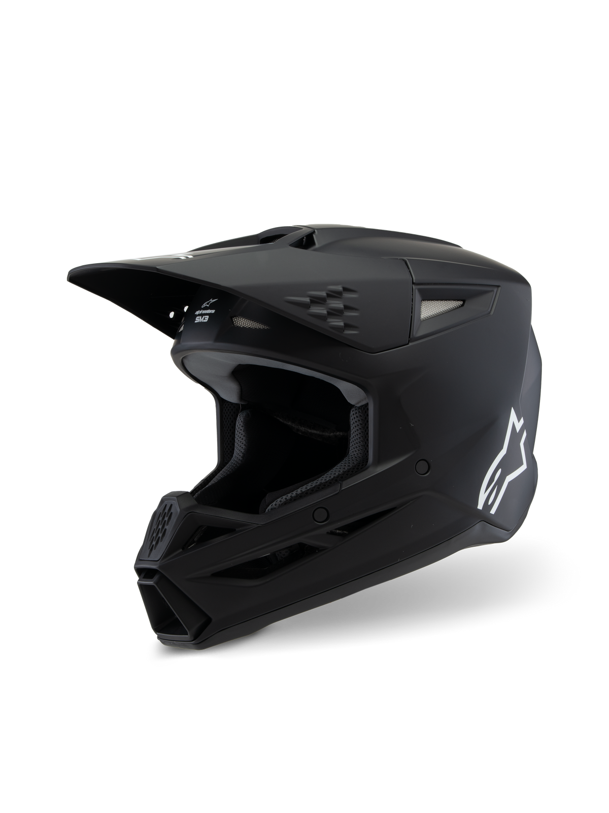 Alpinestars S-M3 Youth Solid Helmet ECE 22.06, Motocross Helmet, Matte Black, side profile view featuring a white Alpinestars logo, aerodynamic shell with ventilation ports and integrated visor, professional off-road head protection for youth riders