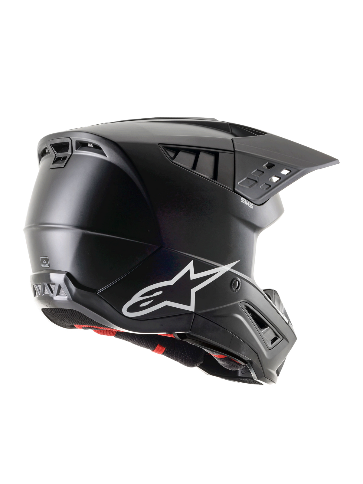 Alpinestars S-M5 Solid Helm ECE 22.06, mattschwarzer Motocross-Helm, Profilansicht von hinten-seitlich mit weißem Alpinestars-Logo, mehreren Belüftungsöffnungen und integriertem Visier für Schutz beim Offroad-Fahren
