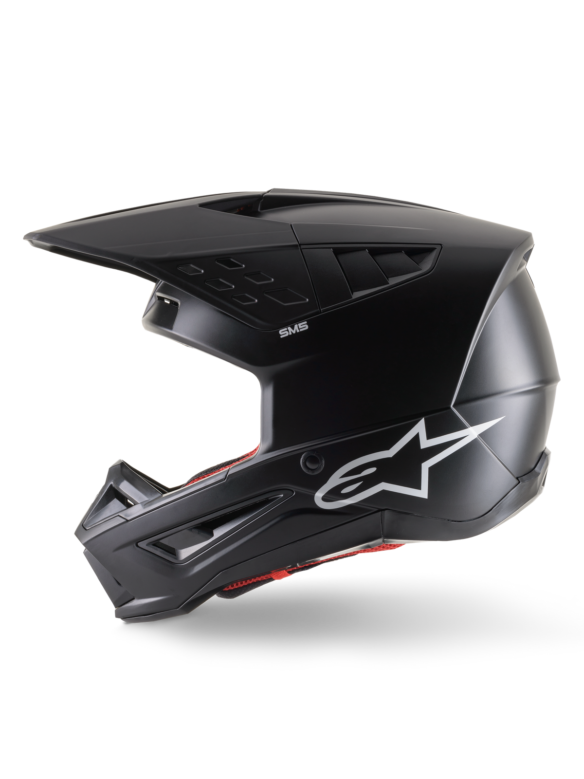Alpinestars S-M5 Solid Helm ECE 22.06, Motocross-Helm, Schwarz Matt, Seitenprofil-Ansicht mit elegantem mattem Finish, weißem Alpinestars-Logo an der Seite, roter Innenpolsterung und aerodynamischer Schale mit integrierten Belüftungsöffnungen