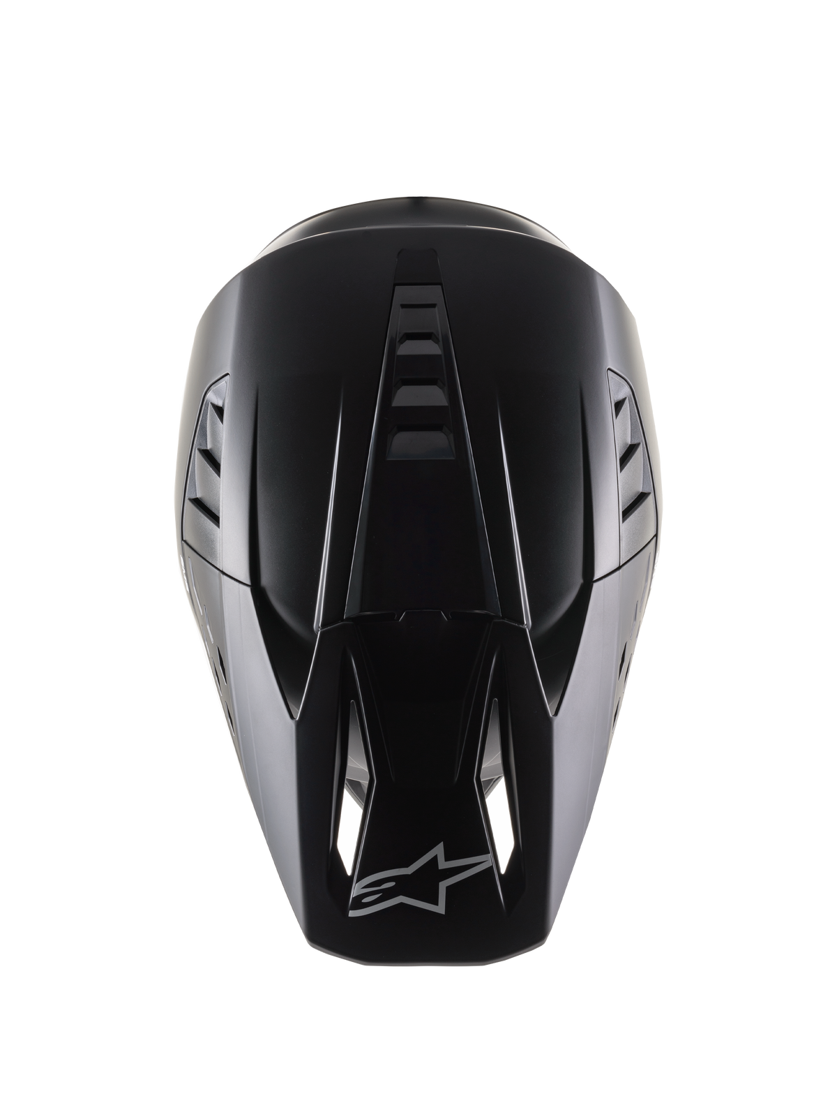 Alpinestars S-M5 Solid Helm ECE 22.06, Motocross-Helm, Schwarz Matt, Ansicht von oben zeigt die aerodynamische Schale mit Belüftungsrippen, Visier mit Lufteinlassöffnungen und Alpinestars-Logo, elegantes mattes Finish für den Offroad-Rennsport.